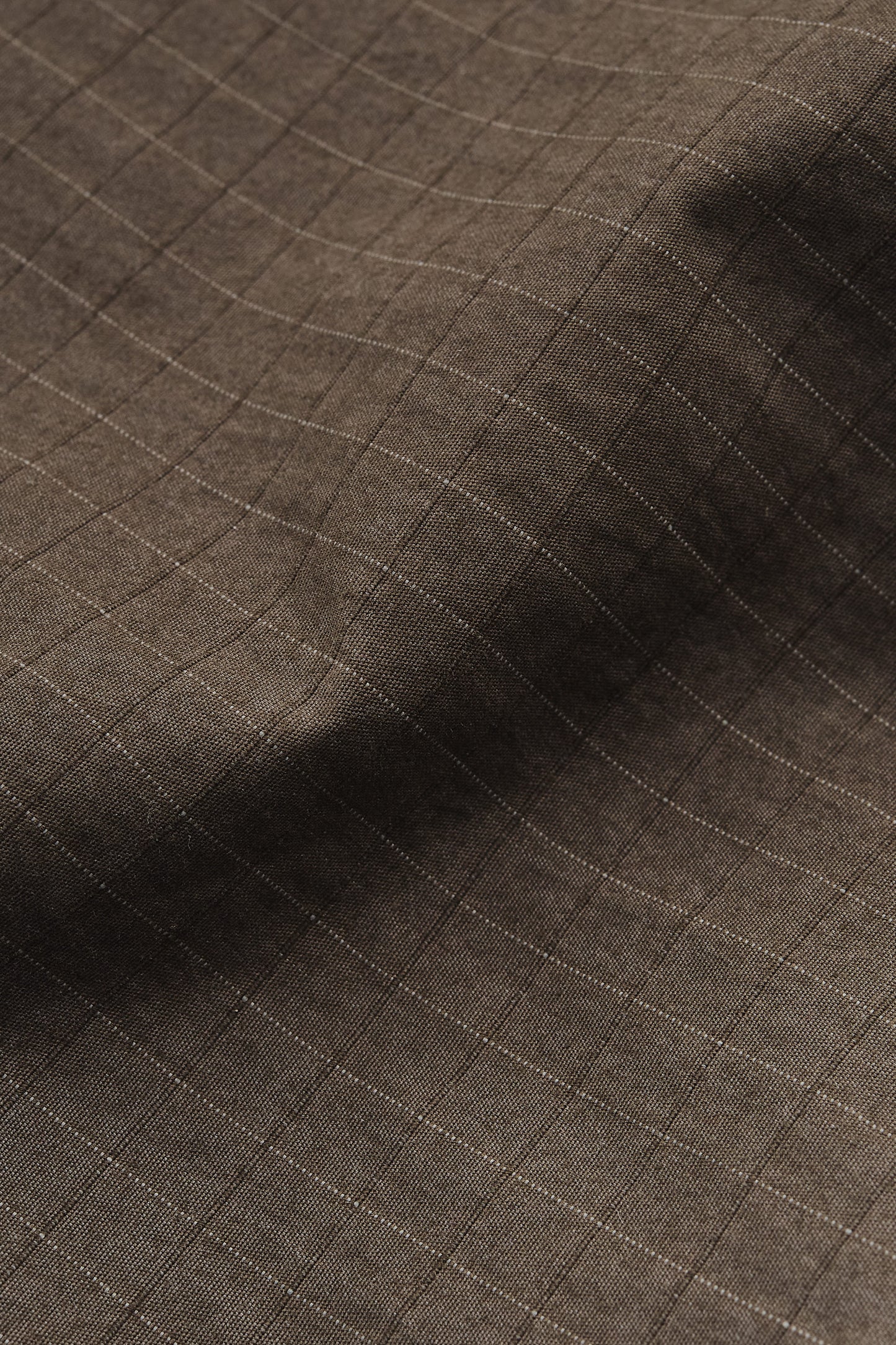 Men's outerwear jacket, brown cotton blend ripstop with subtle white windowpane check.