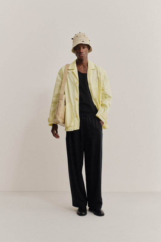 Men's outerwear jacket, recycled polyamide, garment-dyed washed light yellow Matoke Jacket with vintage lapel.