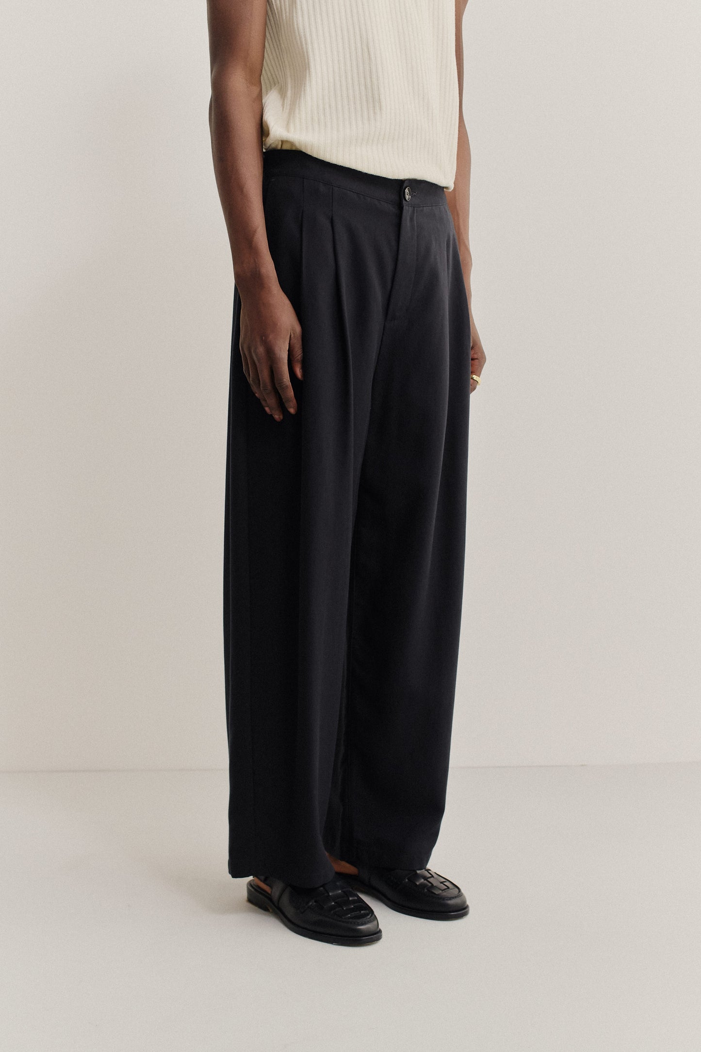 Men's long pants, lyocell heavy twill, deep black, relaxed fit, wide leg, double side pleats.