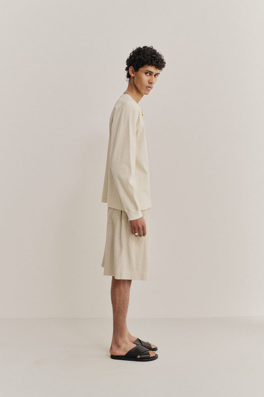 Men's jersey long-sleeved shirt, off-white cotton blend with rib structure and pointelle detailing.
