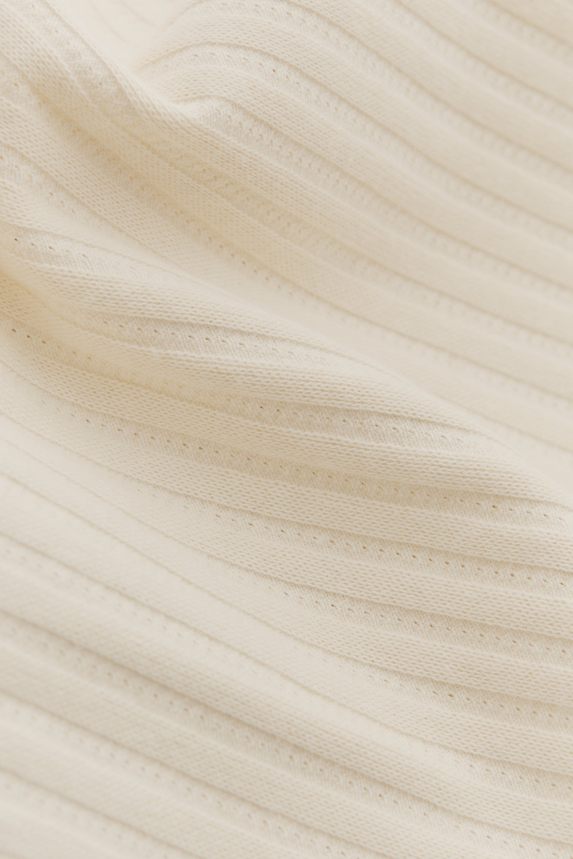 Men's long-sleeved shirt, off-white cotton jersey with rib structure and pointelle detailing.