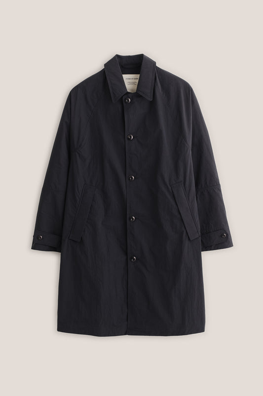 Men's outerwear, oversized Serrara Mac in water-repellent recycled nylon and cotton blend, black.