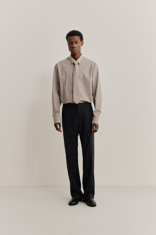 Men's long-pants, 100% virgin wool, black, tailored wide-leg cut with pressed front pleat.