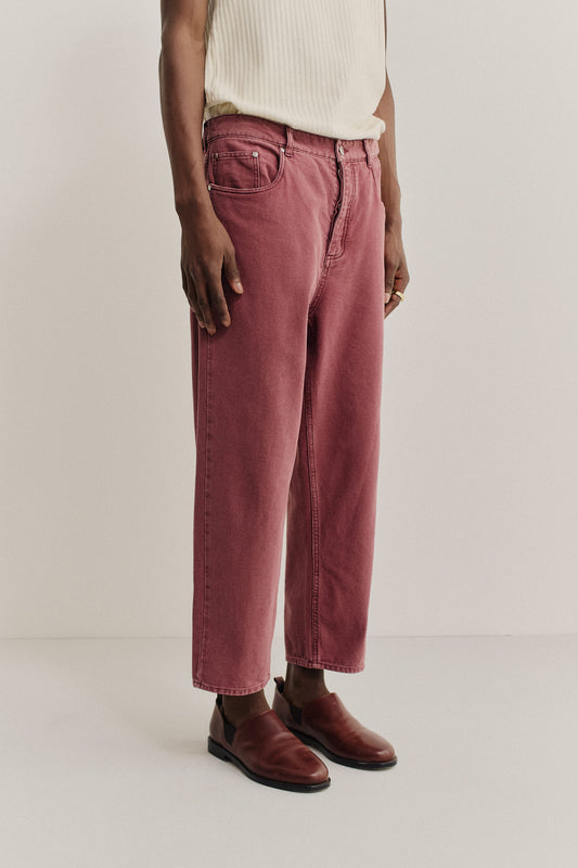 Men's long-pants, organic cotton, stone-washed, red Terek Jeans with a loose, tapered fit.