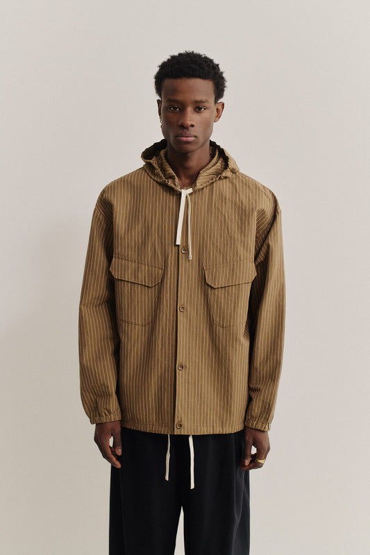 Men's outerwear jacket, cotton-linen seersucker with fine pinstripes, brown, adjustable hem, and hood.