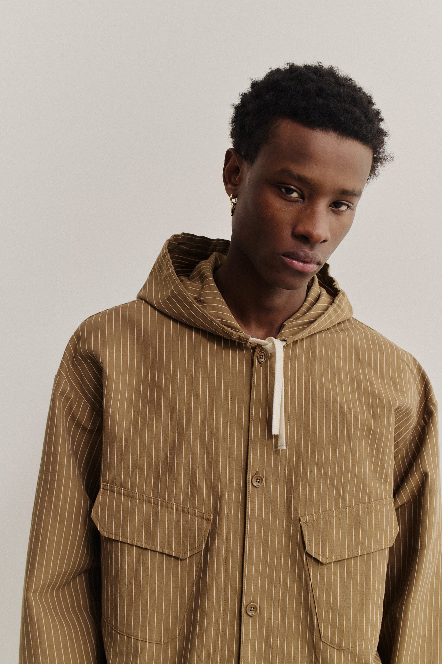 Men's outerwear jacket, cotton-linen seersucker with fine pinstripes, light brown.