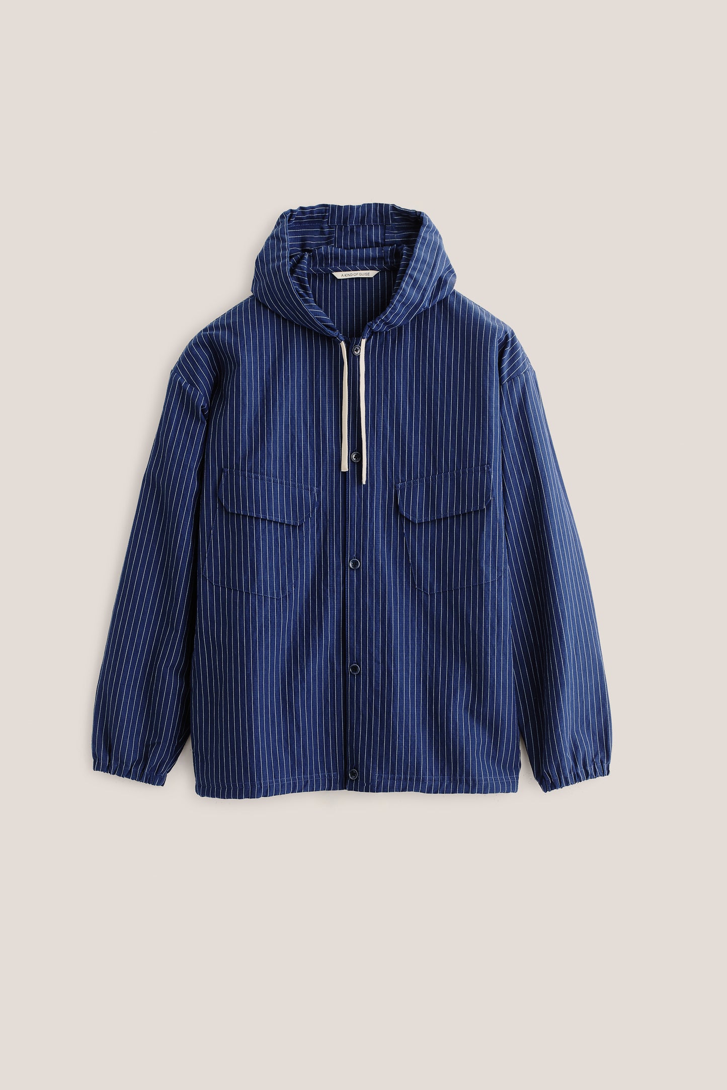 Men's outerwear jacket, cotton-linen seersucker, navy with white pinstripes, hooded, chest pockets.