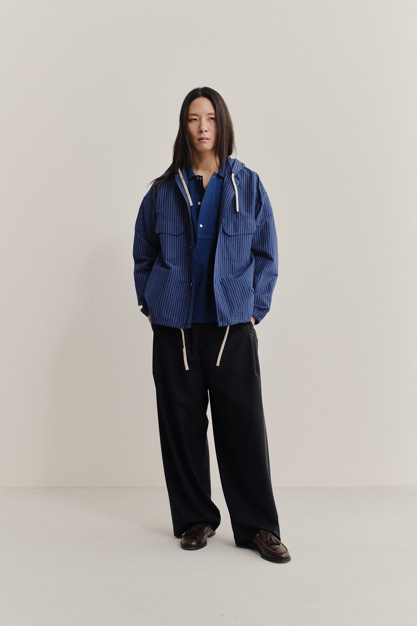 Men's outerwear jacket, cotton-linen seersucker, blue pinstripe, with adjustable hem.