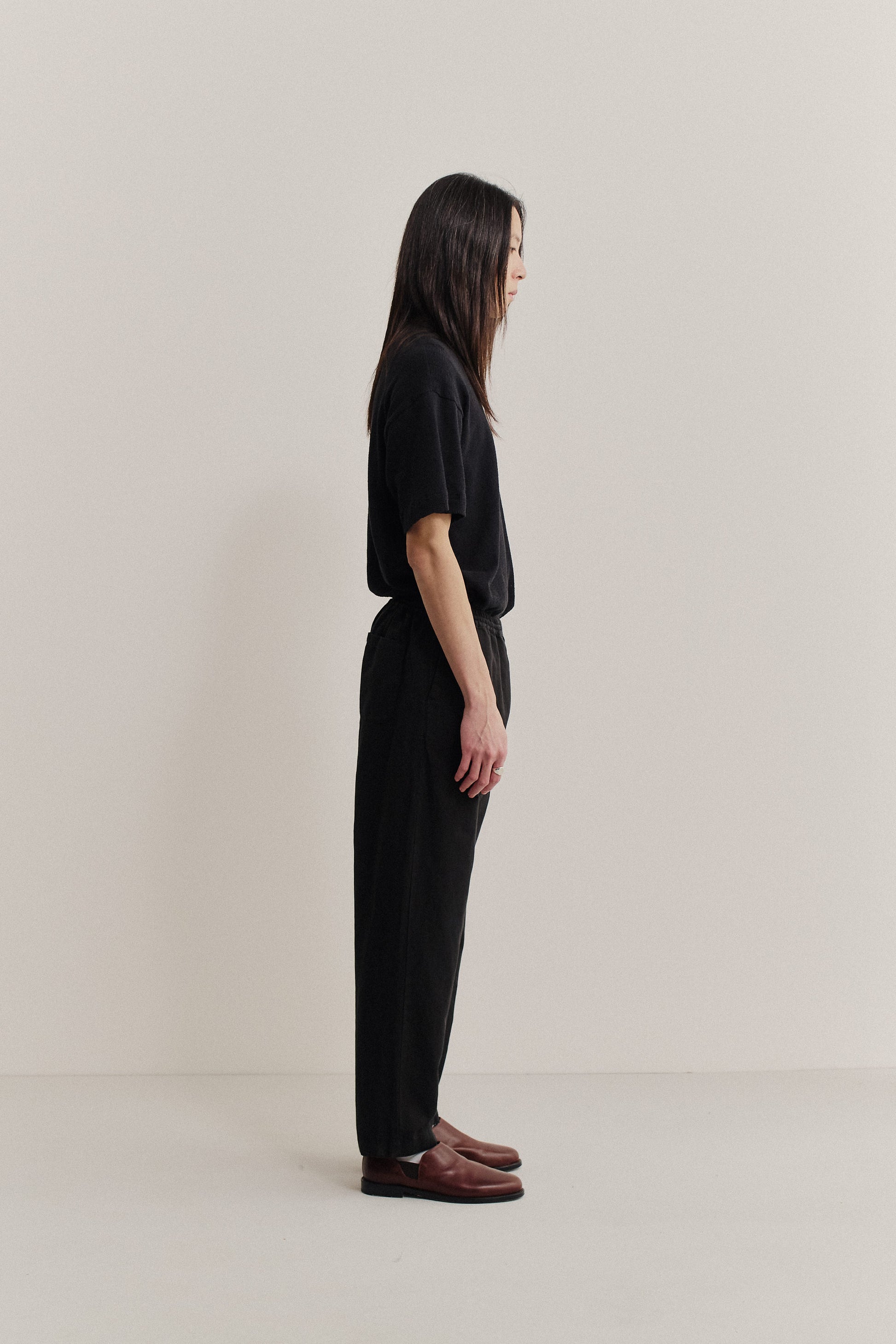 Men's long-pants, linen-cotton mix, garment-dyed black, relaxed fit, cropped leg, elastic waist.