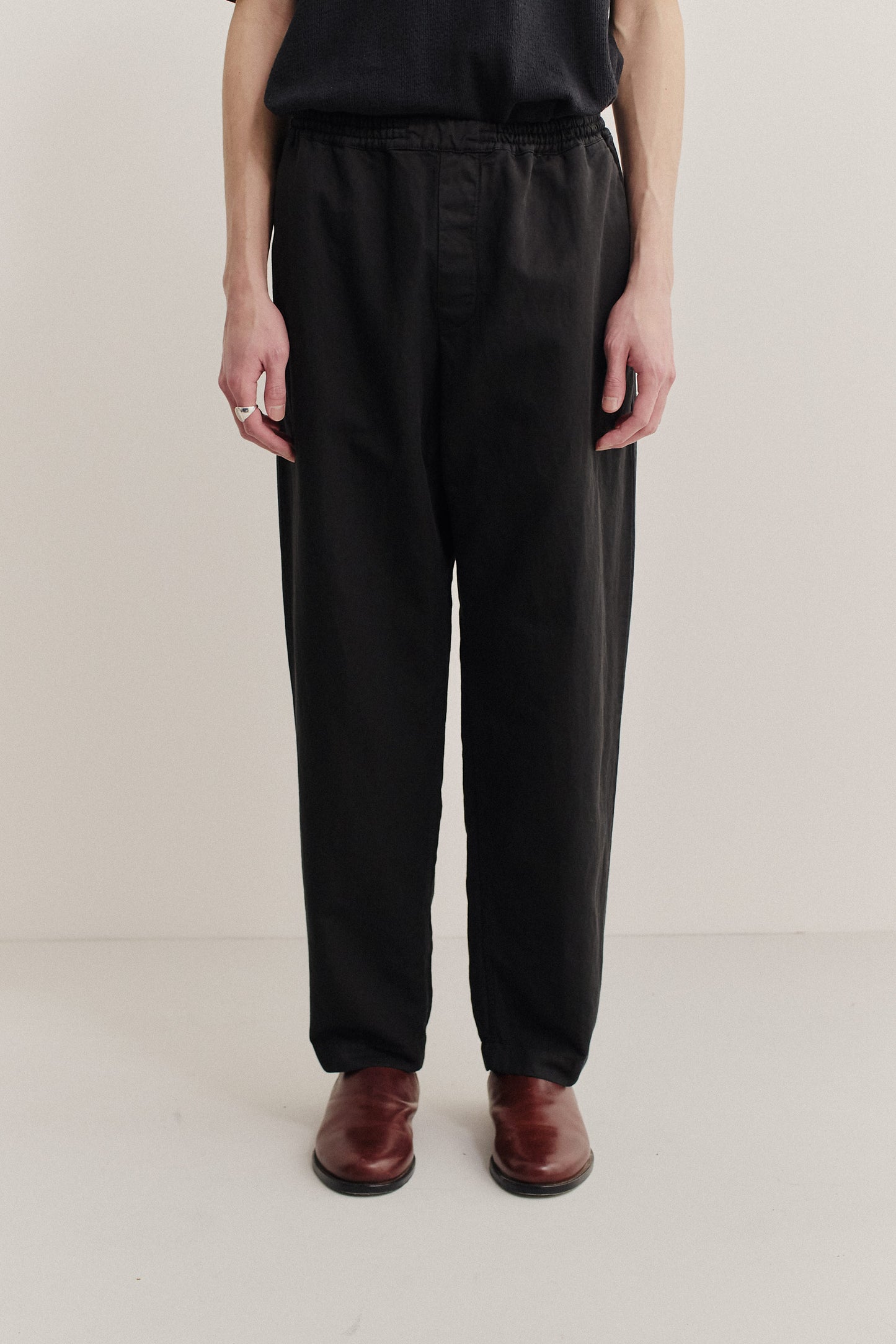 Men's long-pants, linen and cotton blend, garment-dyed black, relaxed fit, elasticated waistband, cropped leg.