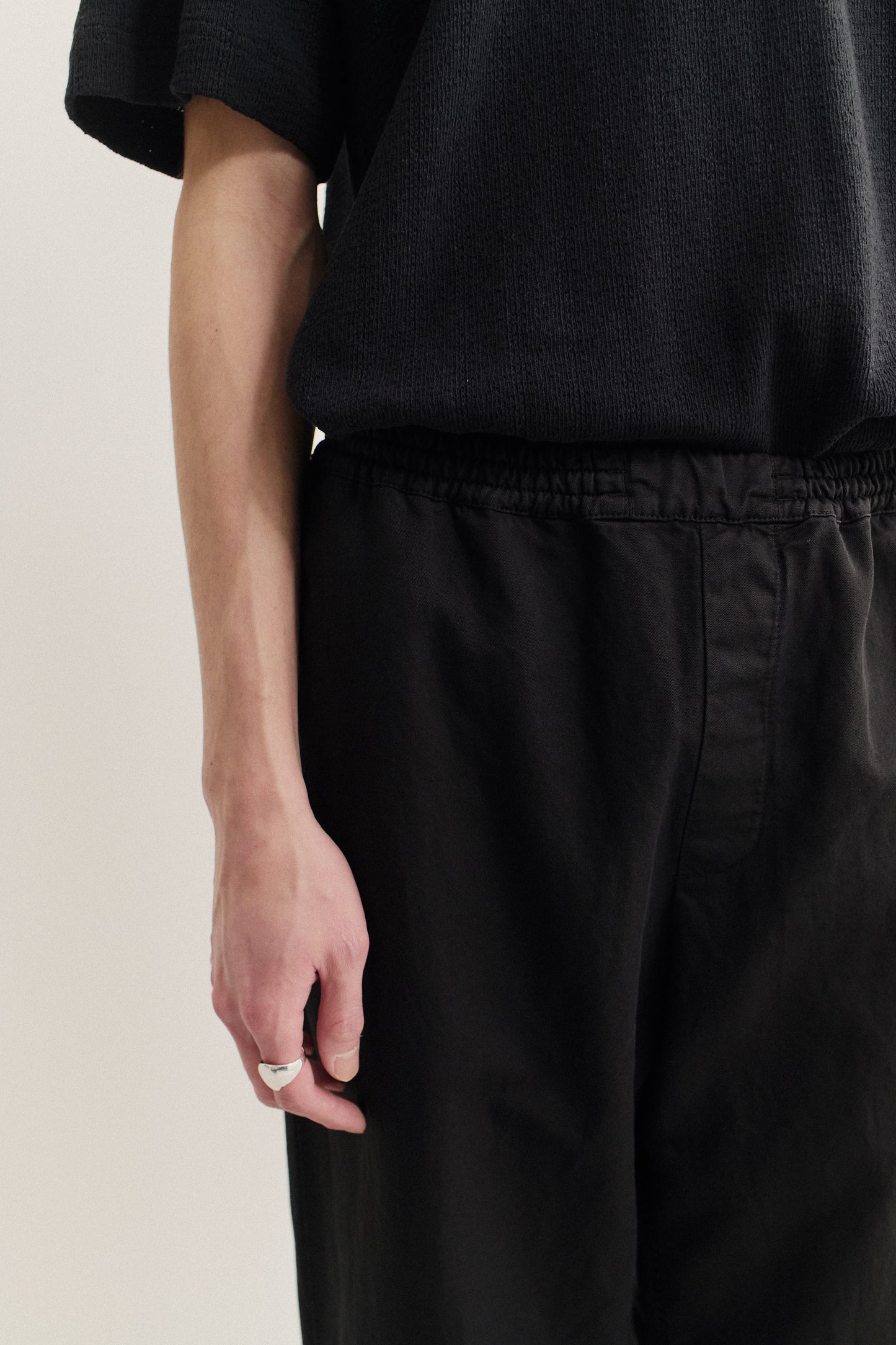 Men's long-pants, linen-cotton blend, garment-dyed black, with elasticated waistband.