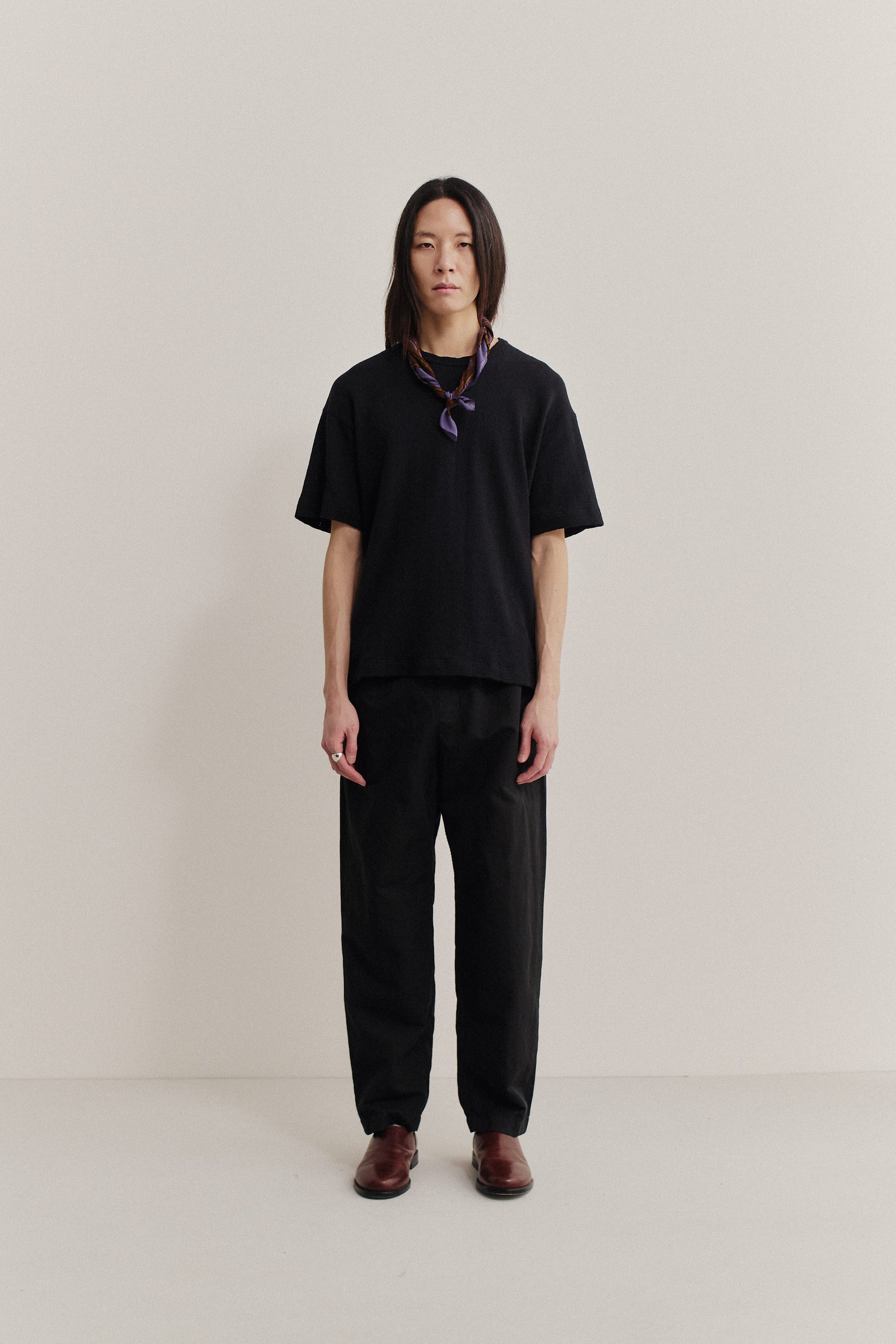 Men's long-pants, linen-cotton blend, garment-dyed black, relaxed fit, tapered cropped leg.