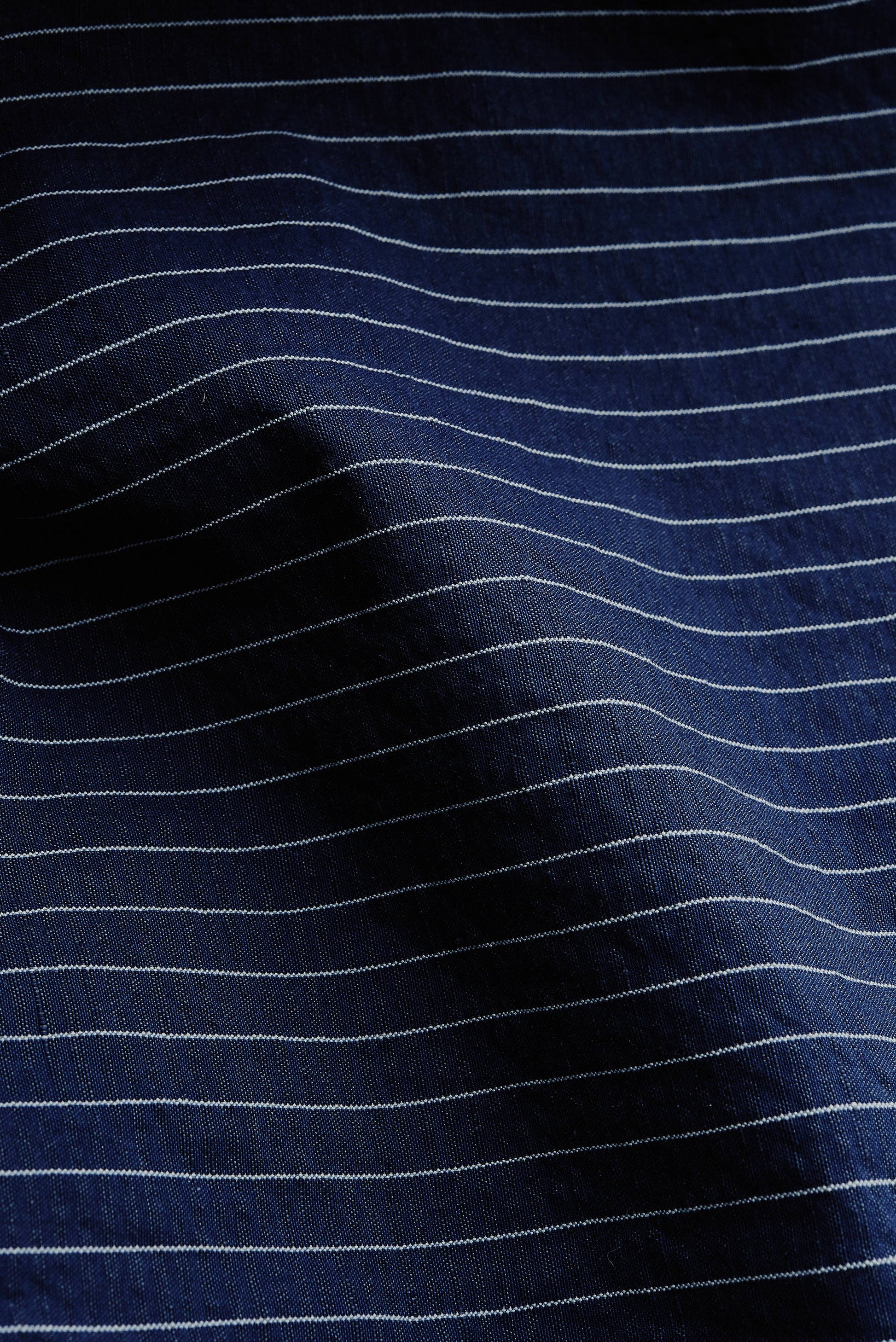 Men's long-pants, cotton-linen seersucker, navy with fine pinstripes.