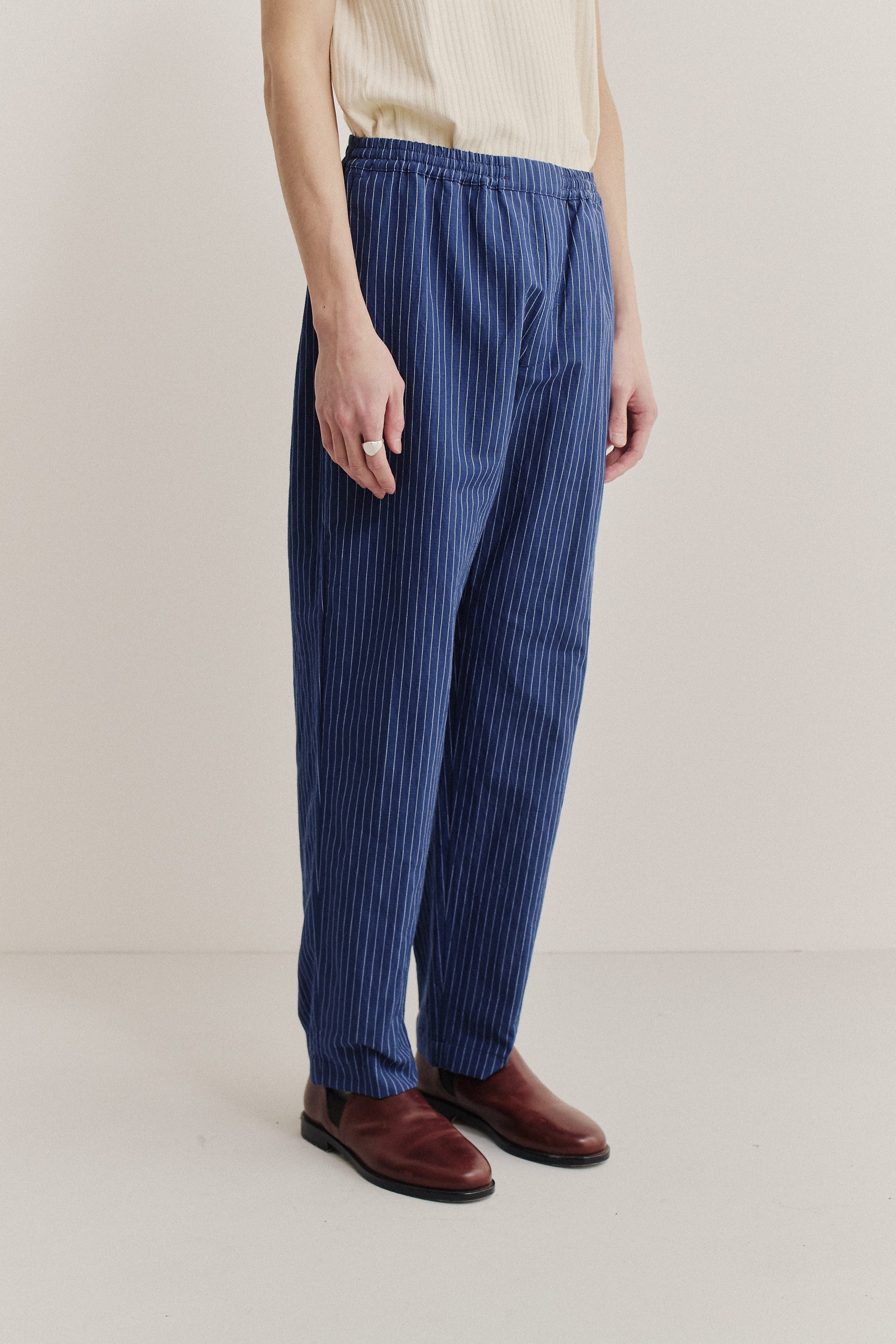 Men's long-pants, cotton-linen seersucker, navy with pinstripes, elastic waist, cropped leg.
