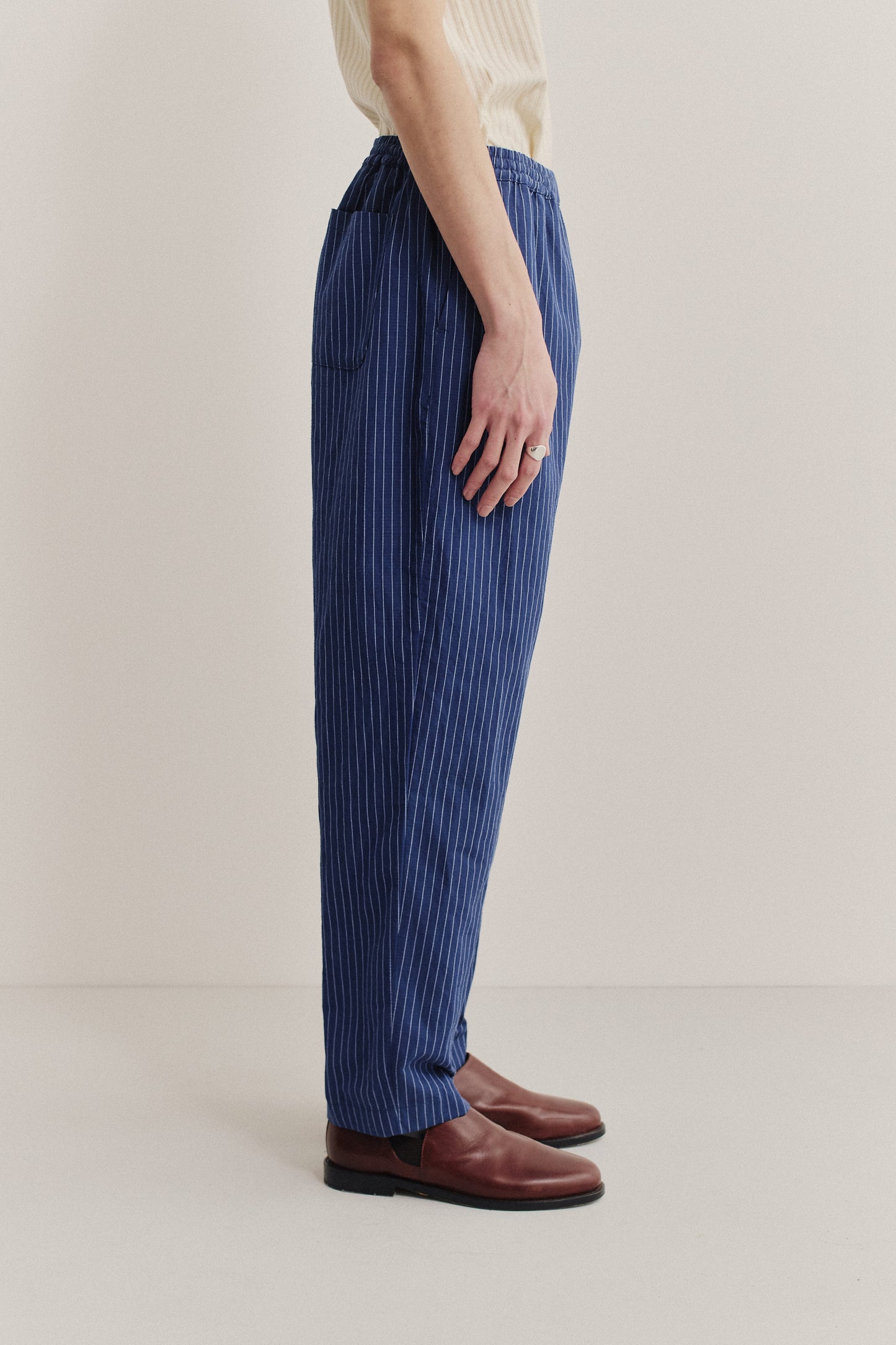 Men's long-pants, cotton-linen seersucker, navy with pinstripes, elastic waist, cropped leg.