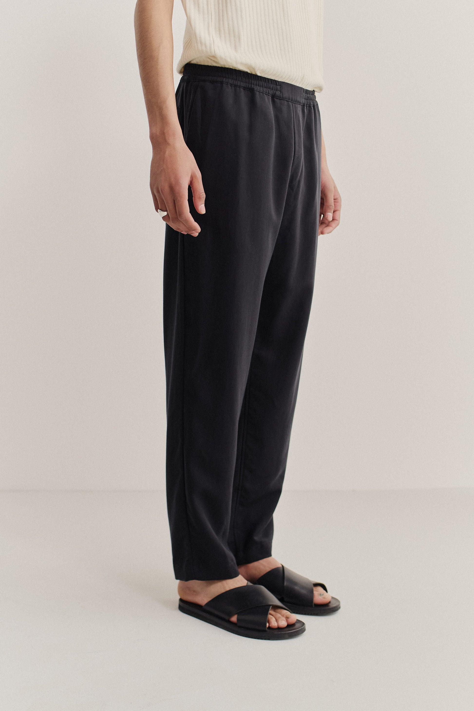 Men's long-pants, lyocell heavy twill, black, relaxed fit, elasticated waist, cropped leg.