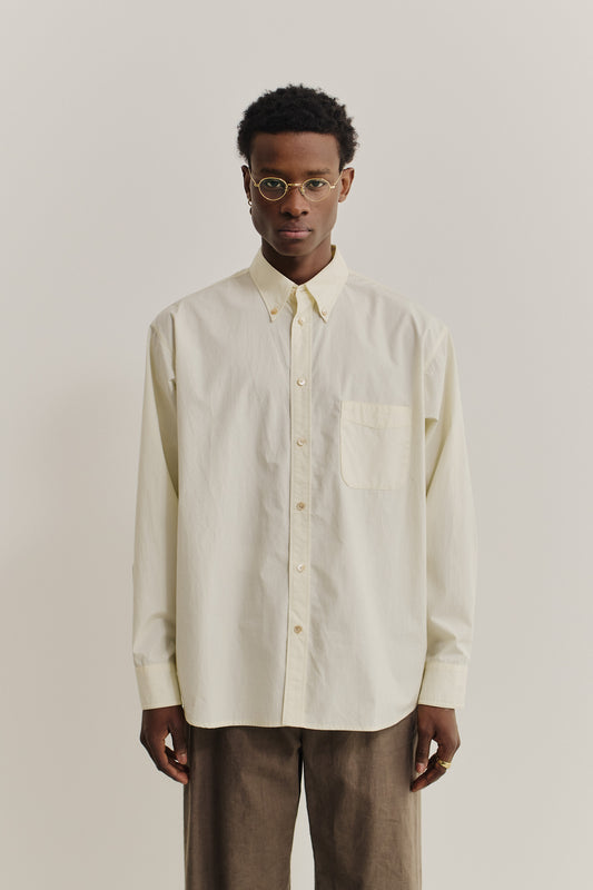 Men's long-sleeved shirt, organic cotton, garment washed, light yellow, with patch pocket.
