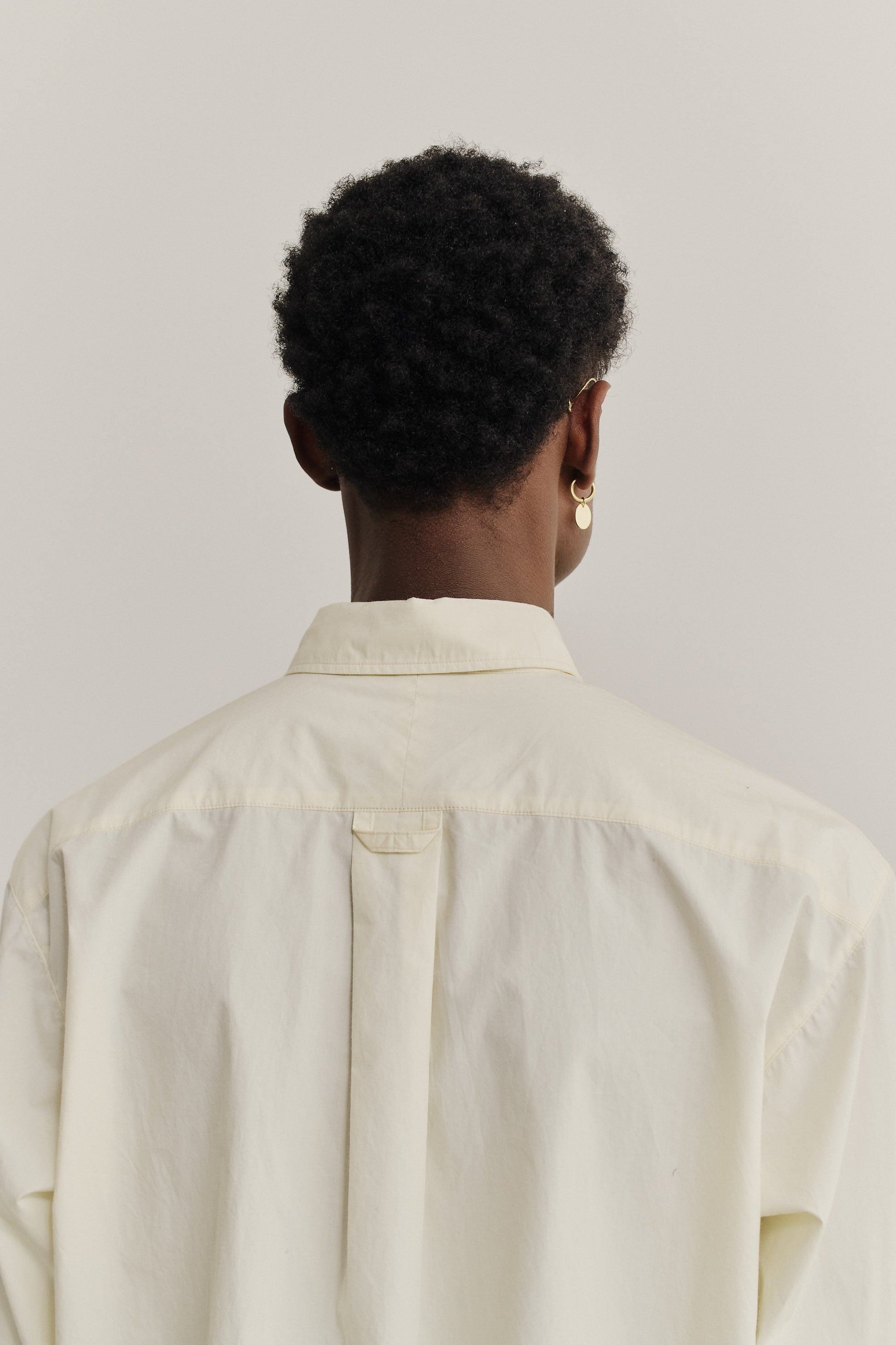 Men's long-sleeved shirt, organic cotton, garment washed, light yellow, with back pleat.