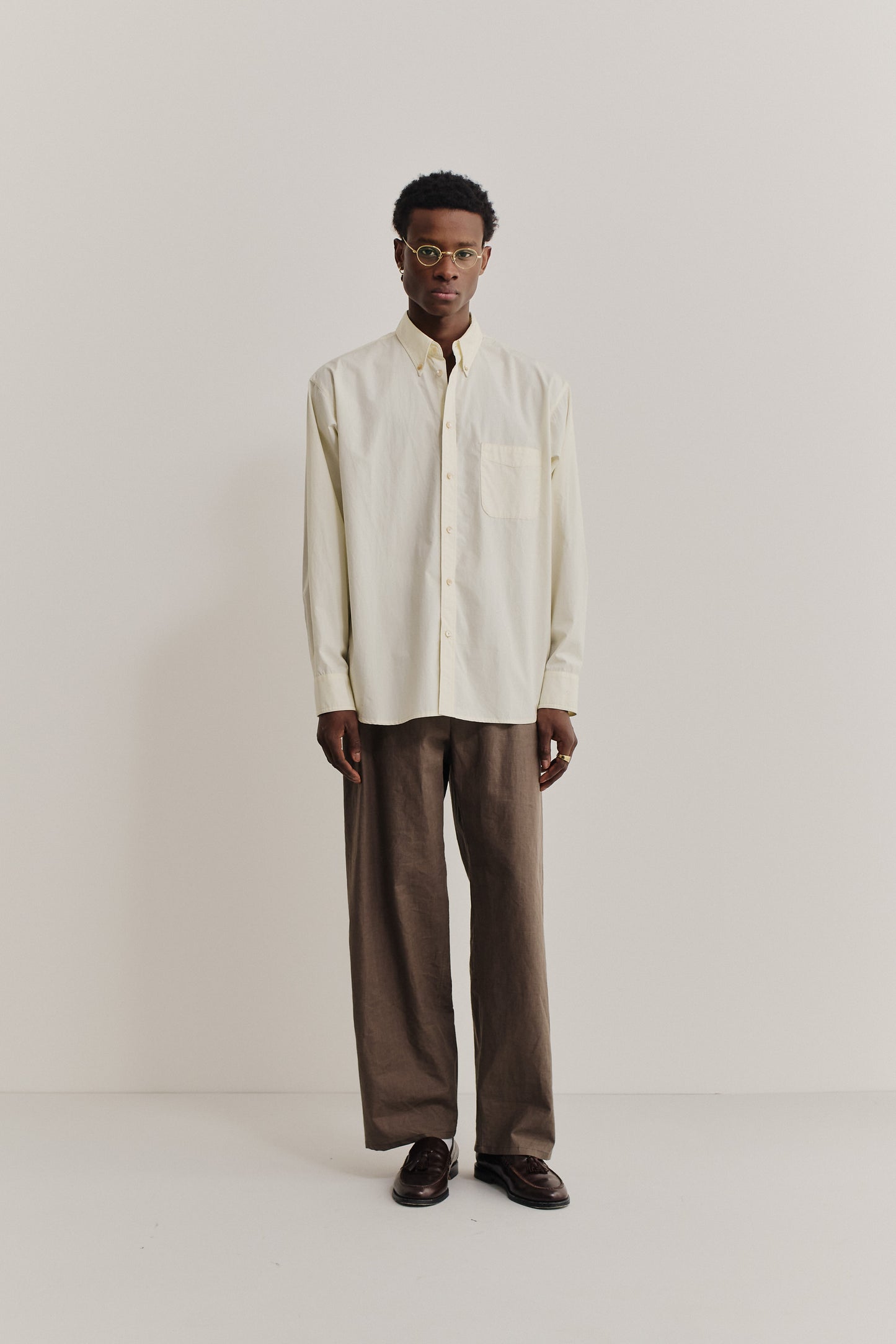 Men's long-sleeved shirt, organic cotton, garment washed, light yellow, oversized with patch pocket.