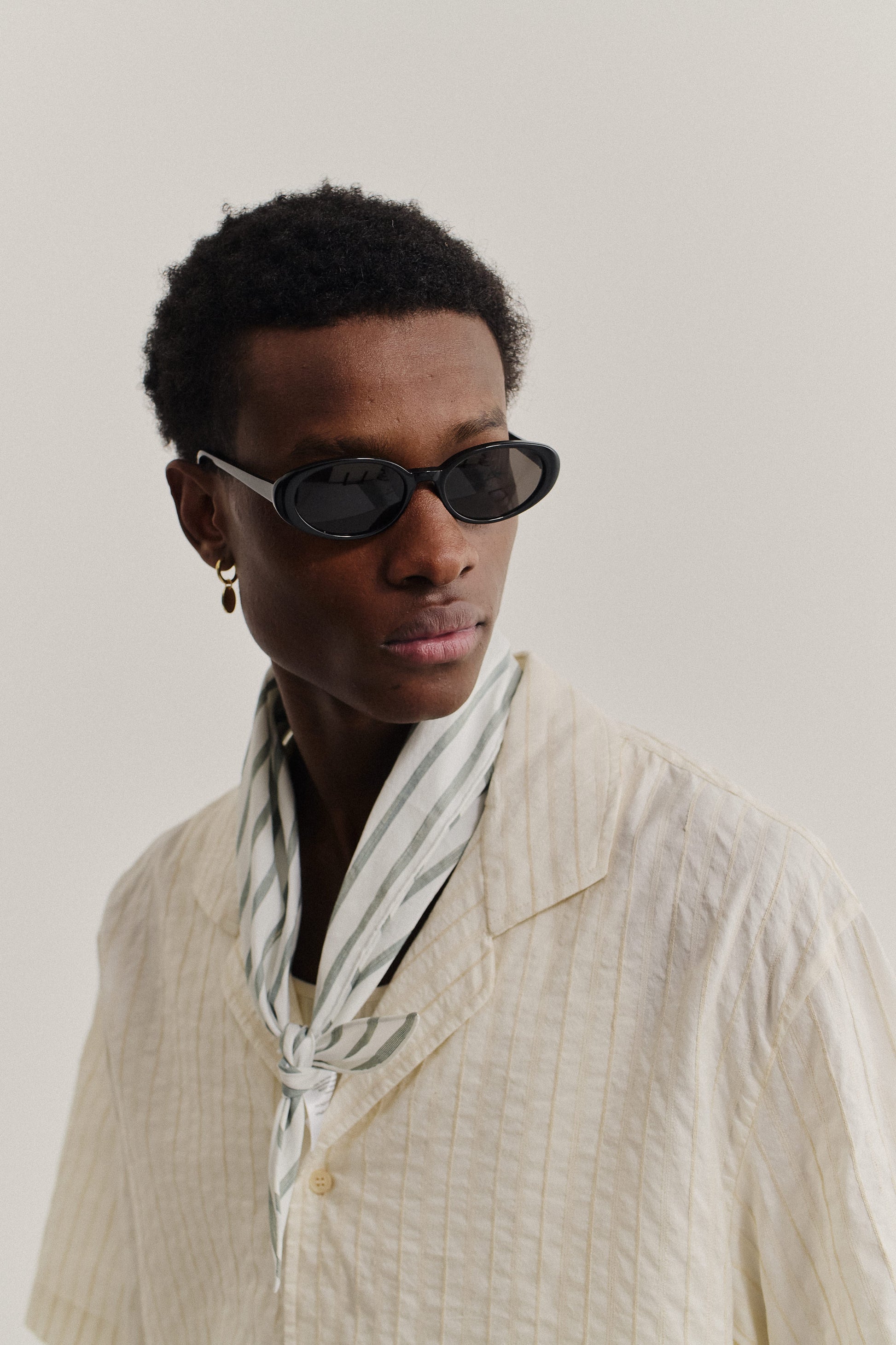 Unisex accessories sunglasses, handcrafted black oval acetate frame, dark grey Carl Zeiss lenses.