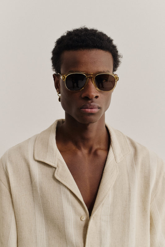 Men's accessories, aviator sunglasses, transparent light brown acetate, dark Carl Zeiss lenses.