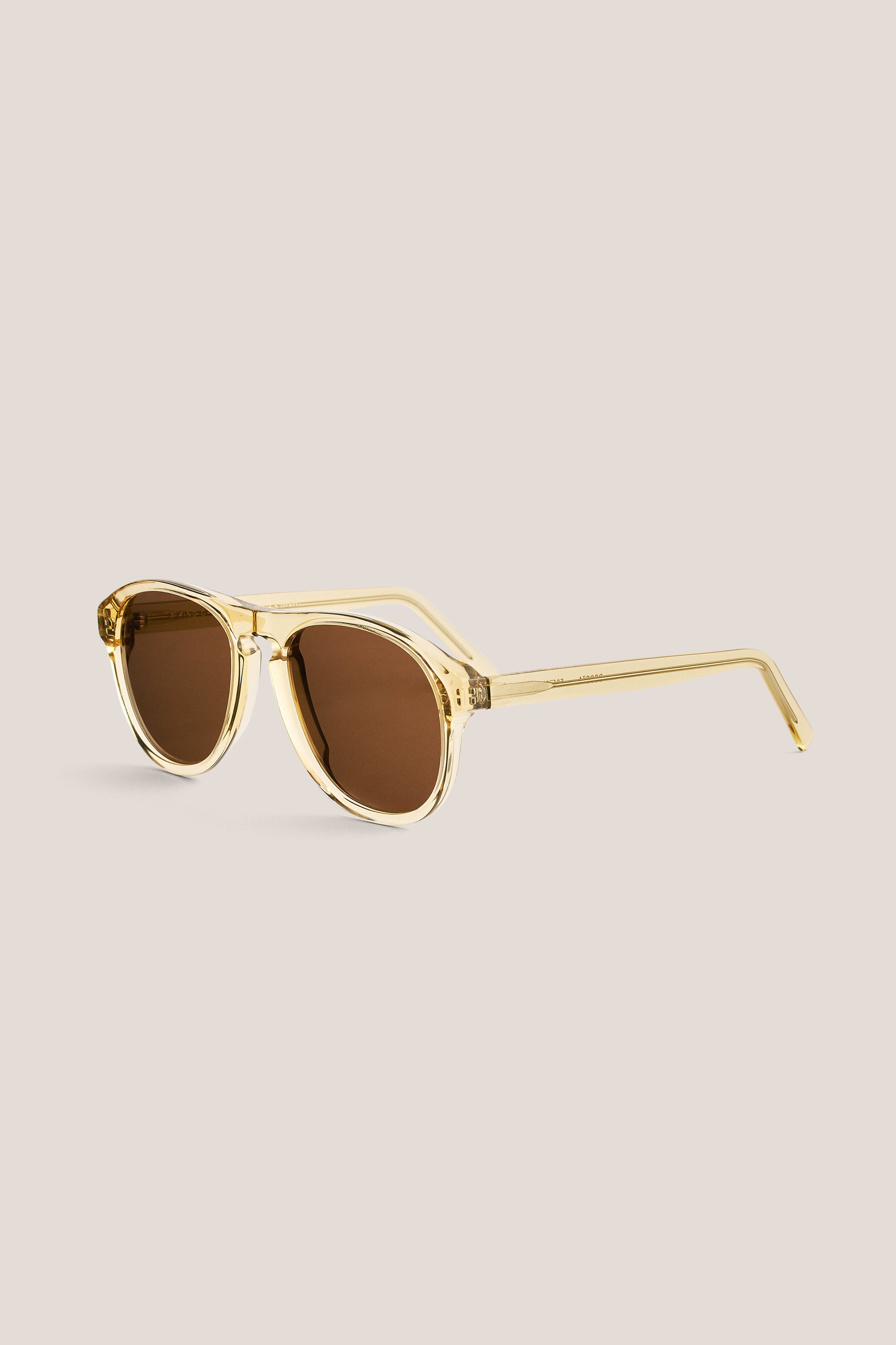 Unisex accessories sunglasses, handcrafted transparent acetate aviator frames with brown Carl Zeiss lenses.