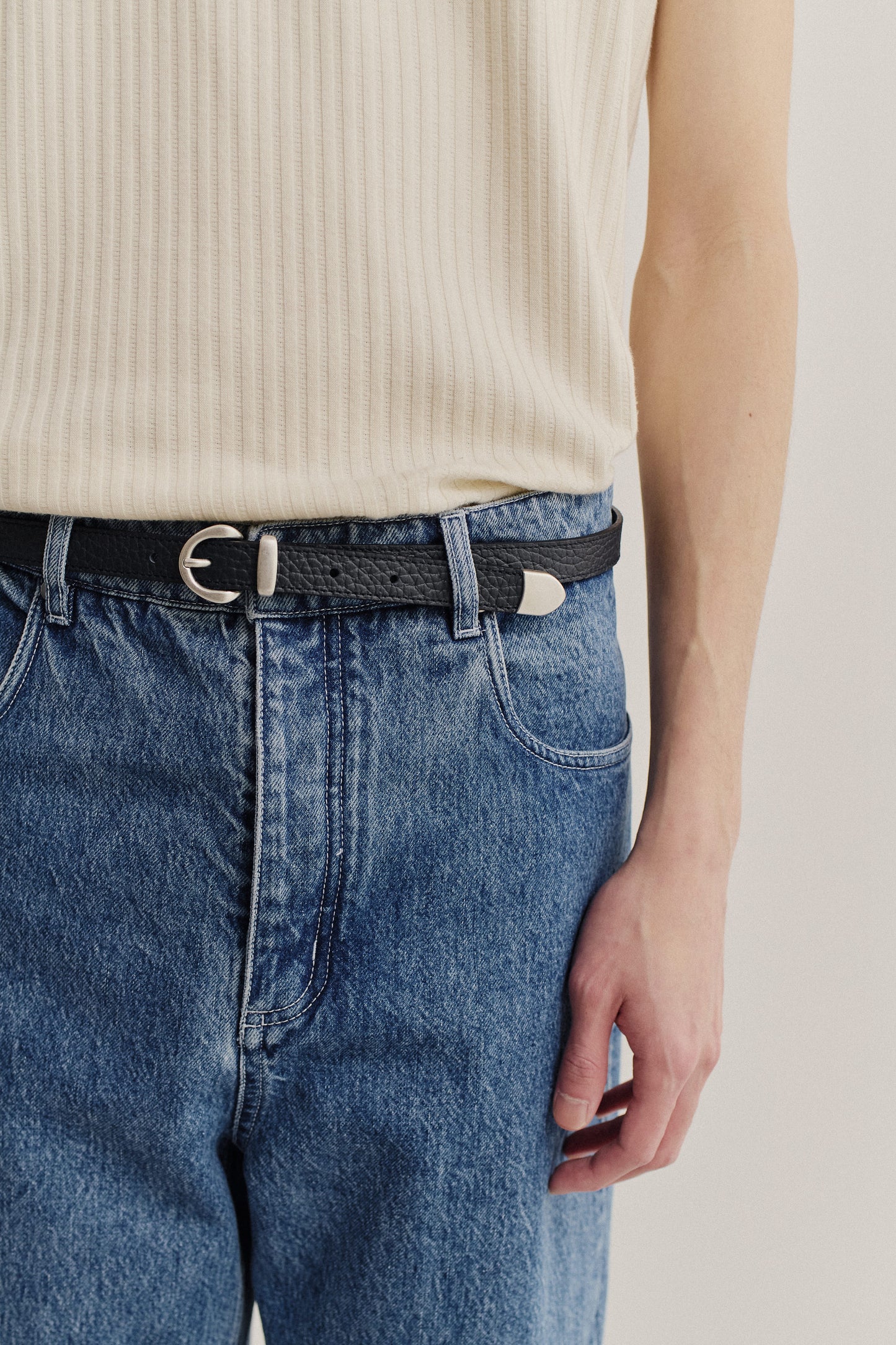 Men's accessories belt, grainy calf leather, black, with silver buckle and tip.