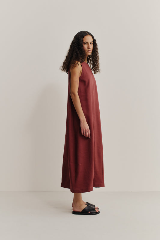 Women's dress, Diani, linen-virgin wool-mohair blend, prunelle weave, brick red, oversized O-shaped silhouette.