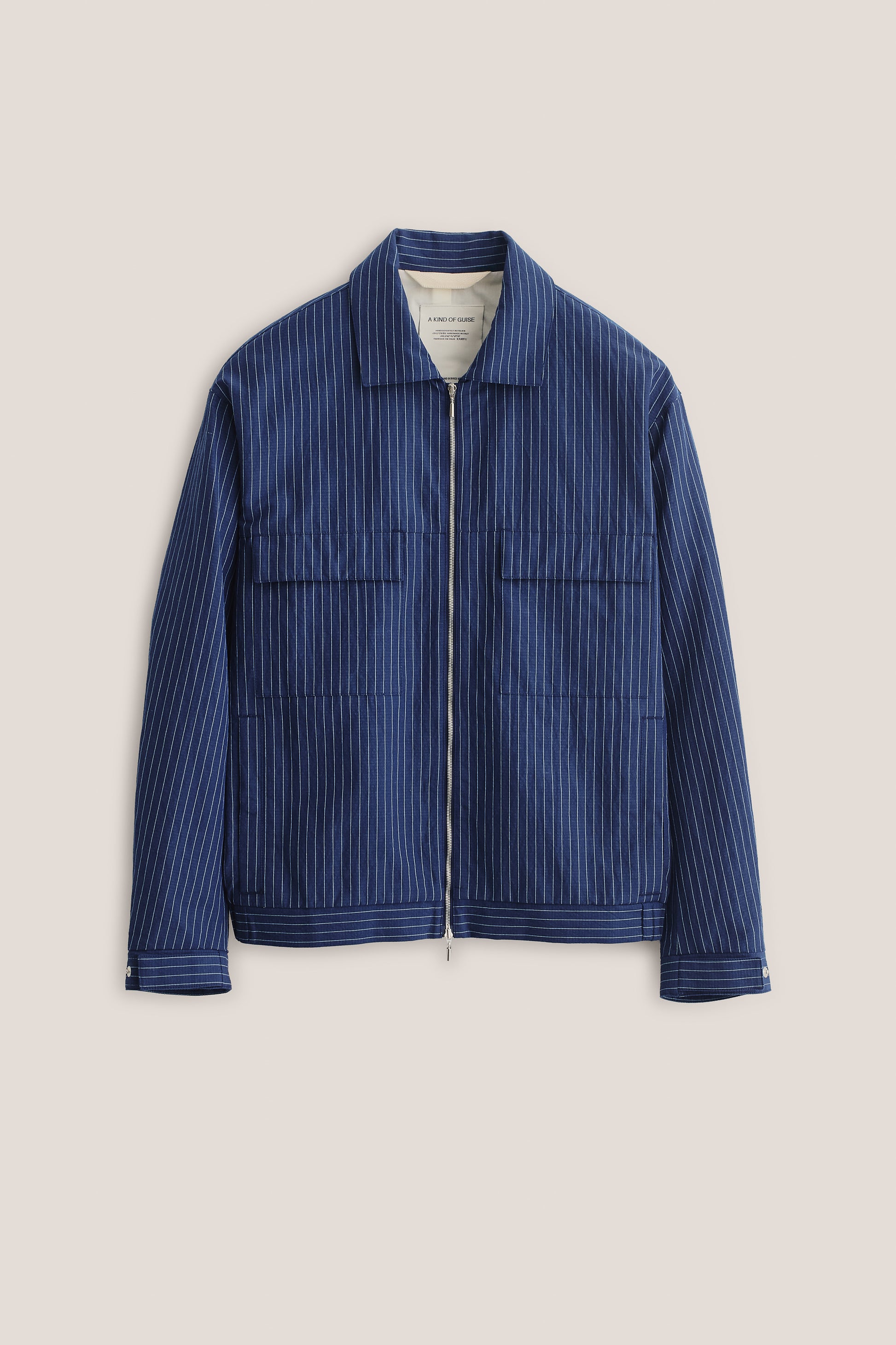 Men's outerwear jacket, cotton-linen seersucker, navy with pinstripes, boxy fit, flap chest pockets, front zip.
