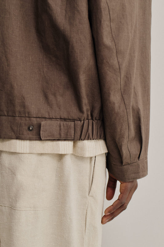 Men's outerwear jacket, 100% linen, natural brown, with elasticated waist and flap chest pockets.