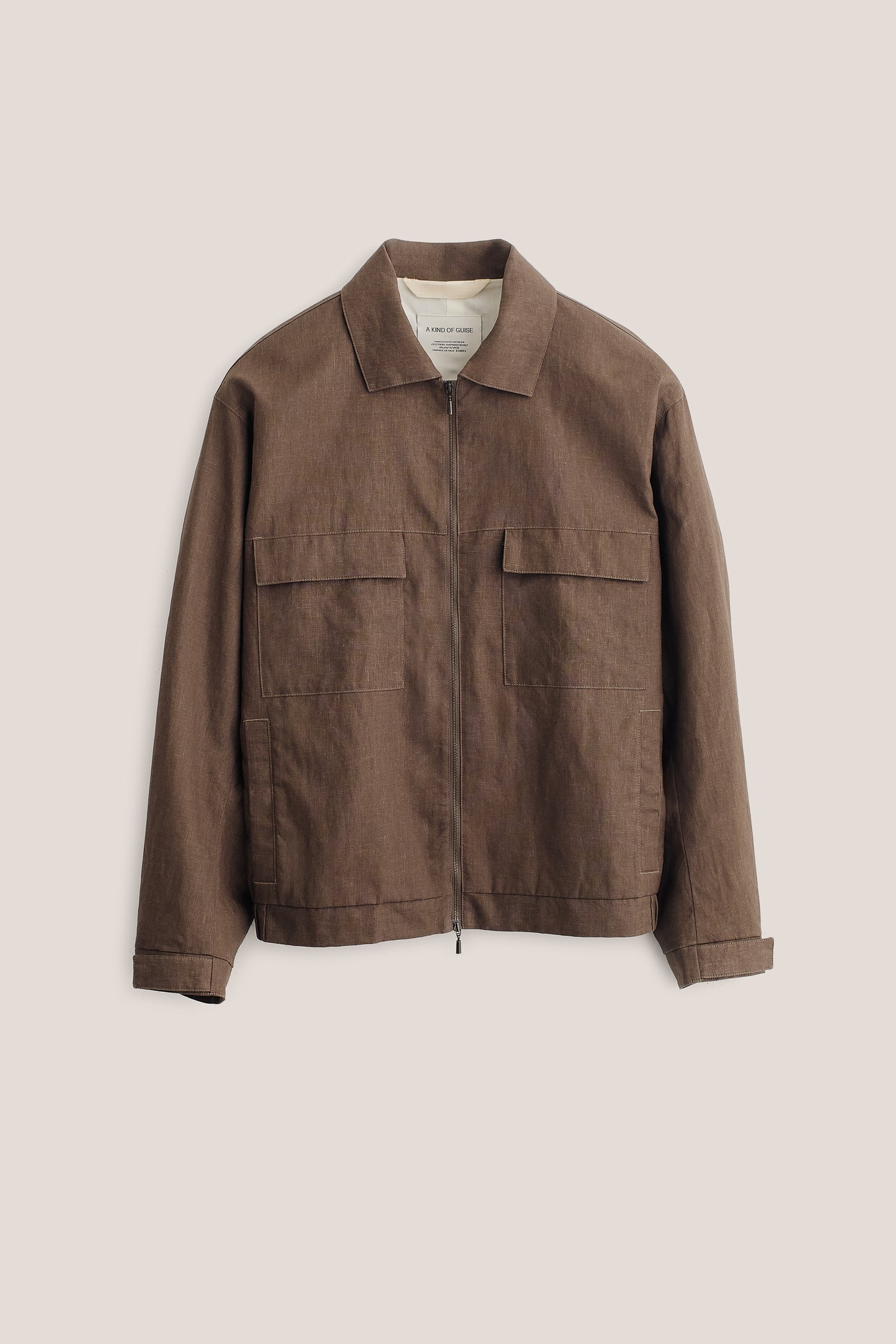 Men's outerwear jacket, 100% linen, natural brown, boxy silhouette, flap chest pockets, front zip.
