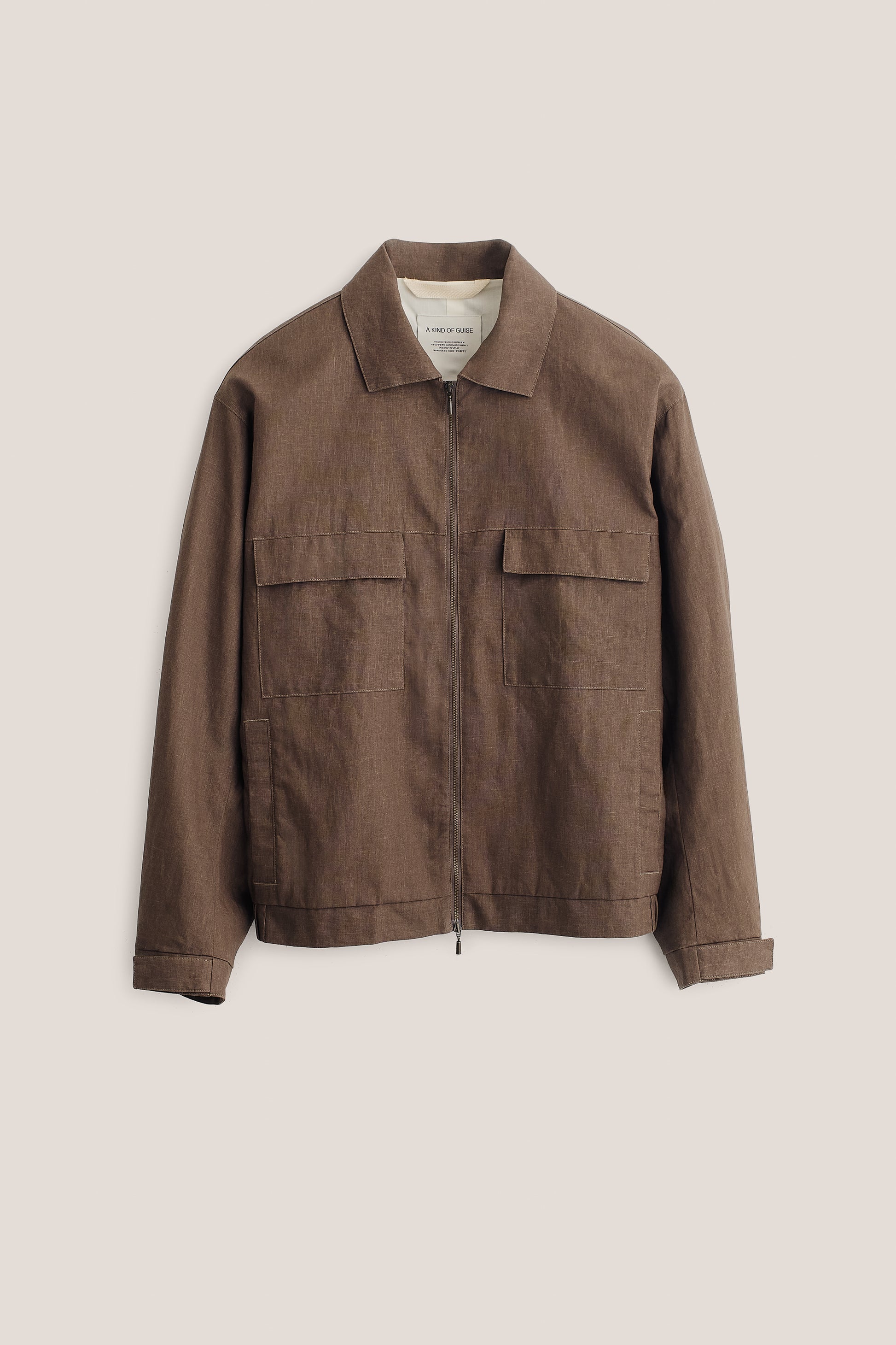 Men's outerwear jacket, 100% linen, natural brown, boxy silhouette, flap chest pockets, front zip.