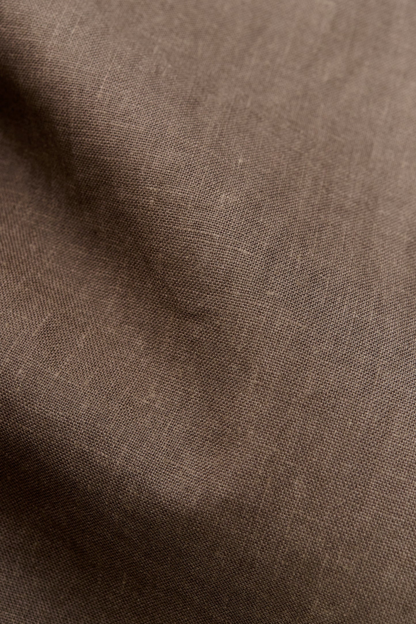 Men's outerwear jacket, 100% linen, natural brown, with a subtly crushed surface.