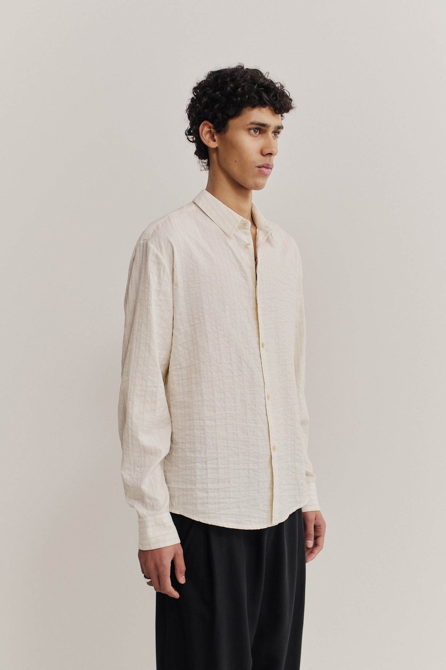 Men's long-sleeved shirt, cotton-silk-linen mix, washed, off-white with irregular stripes.