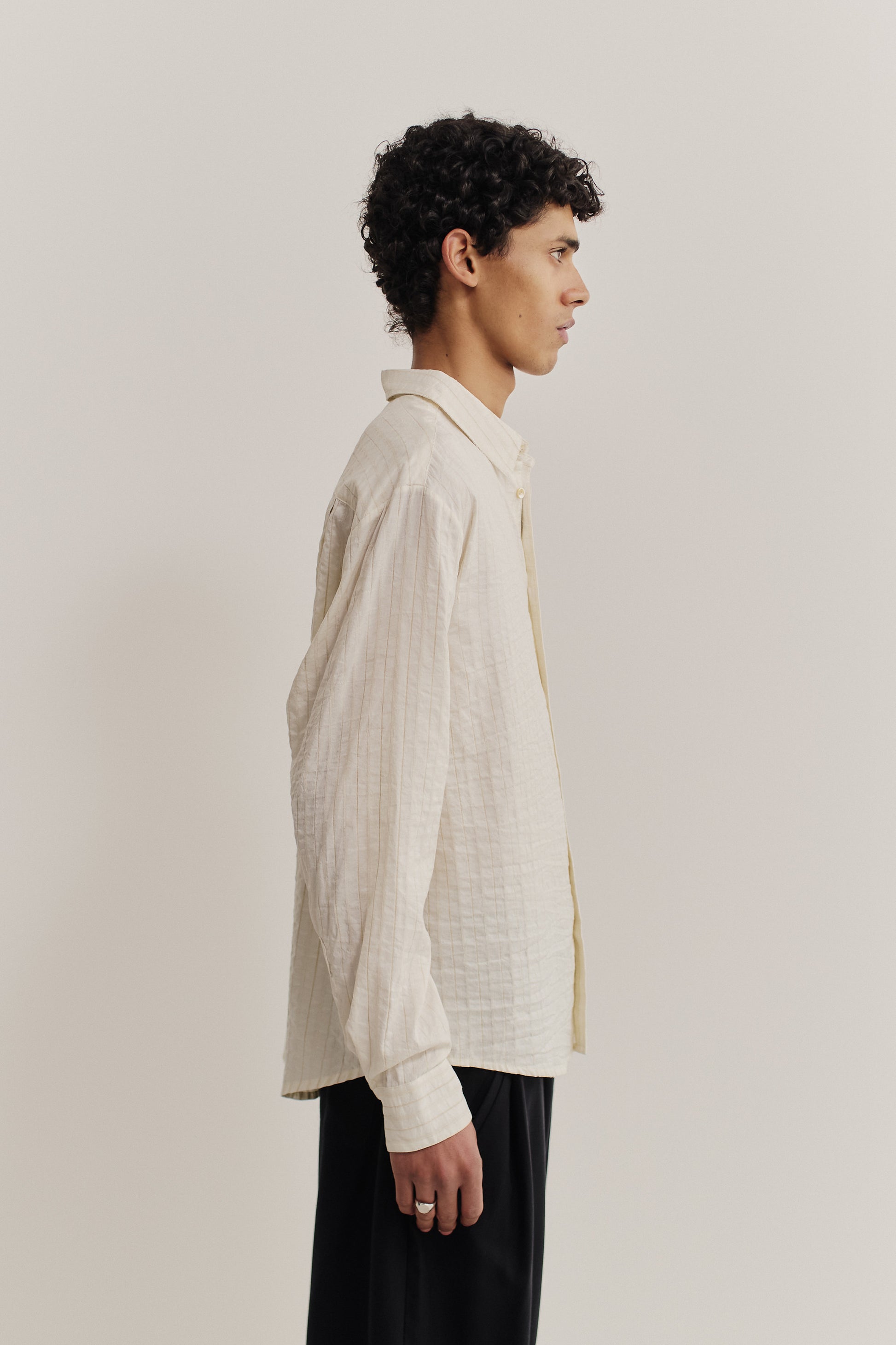 Men's long-sleeved shirt, cotton-silk-linen blend, washed, cream with subtle irregular stripes.