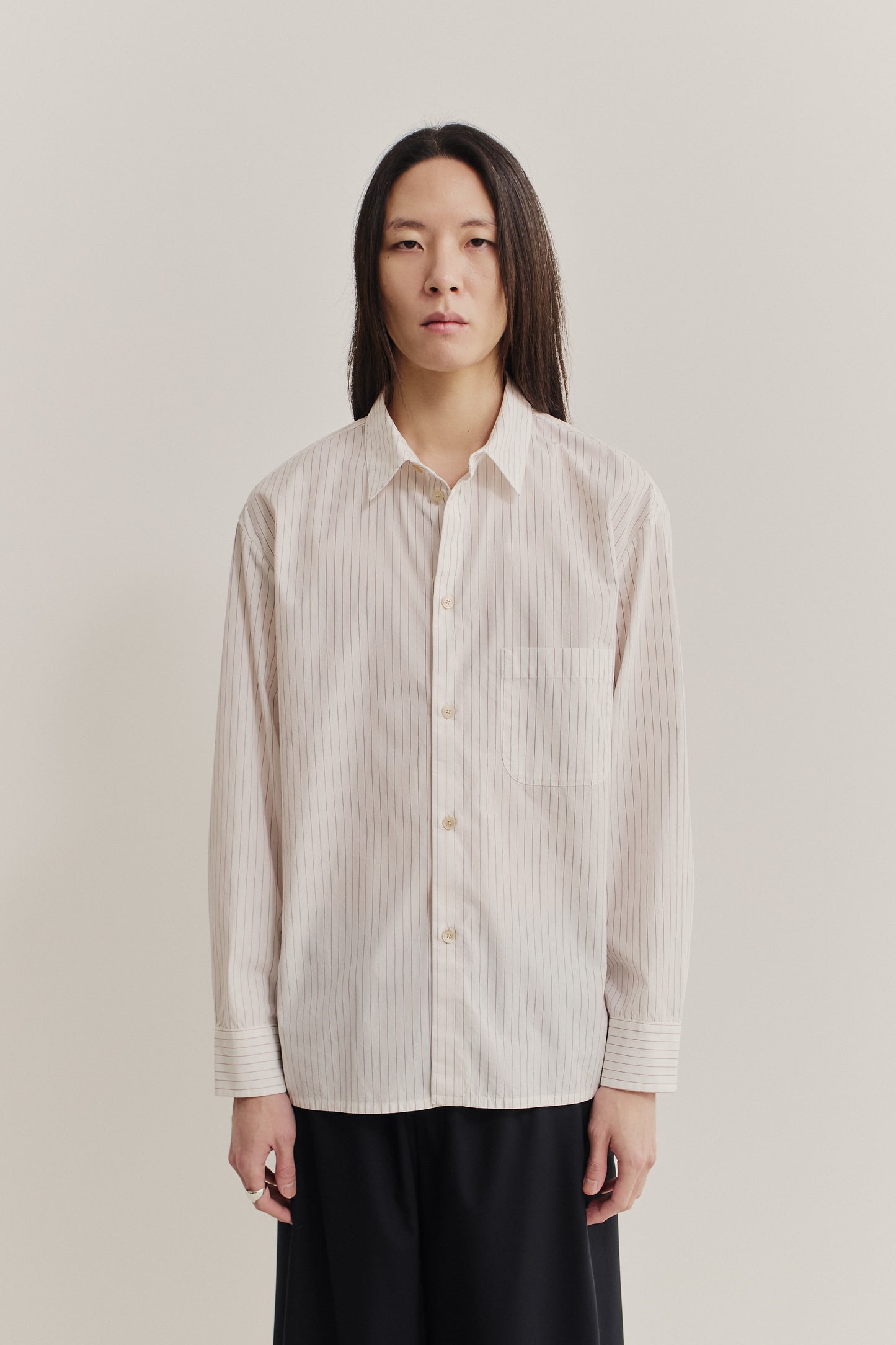 Men's long-sleeved shirt, 100% cotton, off-white with burgundy pinstripes, oversized fit, front patch pocket.