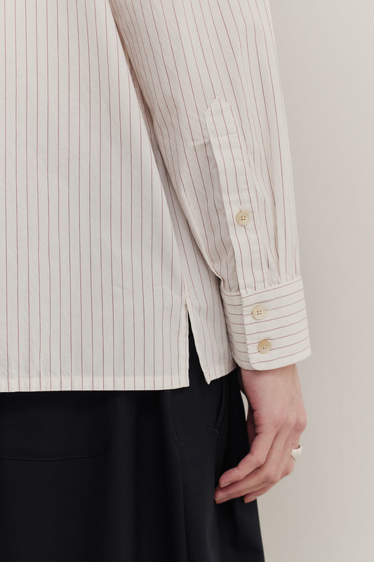 Men's long-sleeved shirt, 100% cotton, off-white with burgundy pinstripes, oversized fit, front pocket.