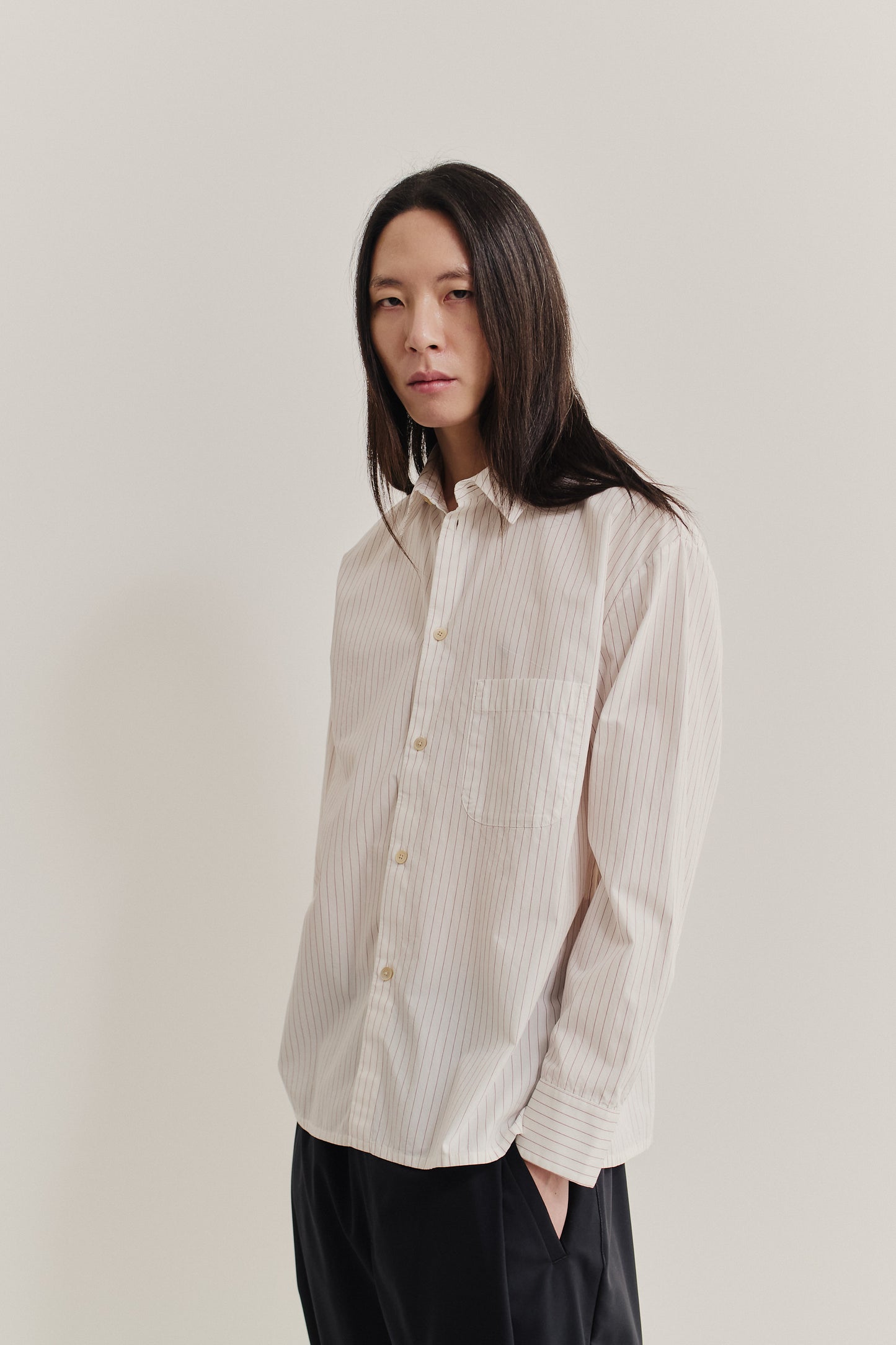 Men's long-sleeved shirt, 100% cotton, off-white with burgundy pinstripes, oversized fit, front patch pocket.