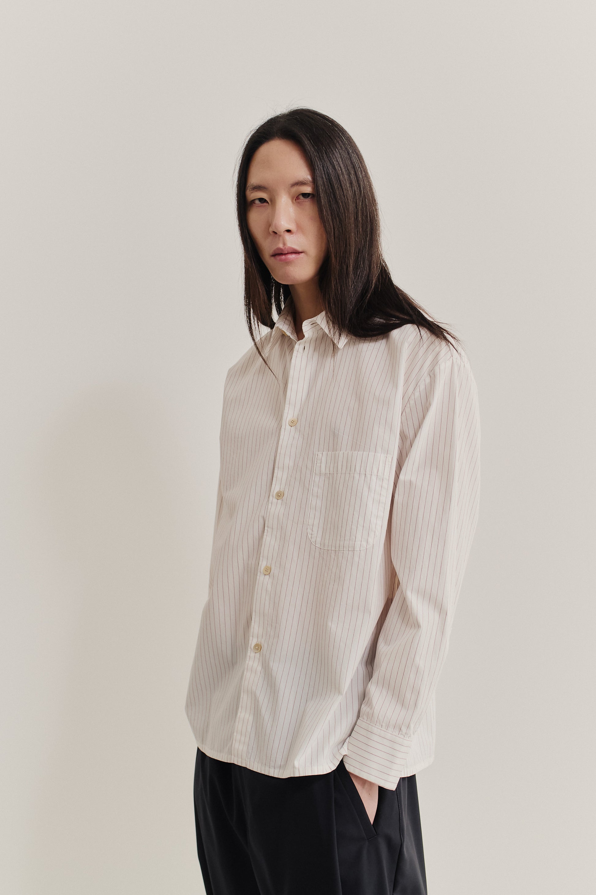 Men's long-sleeved shirt, 100% cotton, off-white with burgundy pinstripes, oversized fit, front patch pocket.