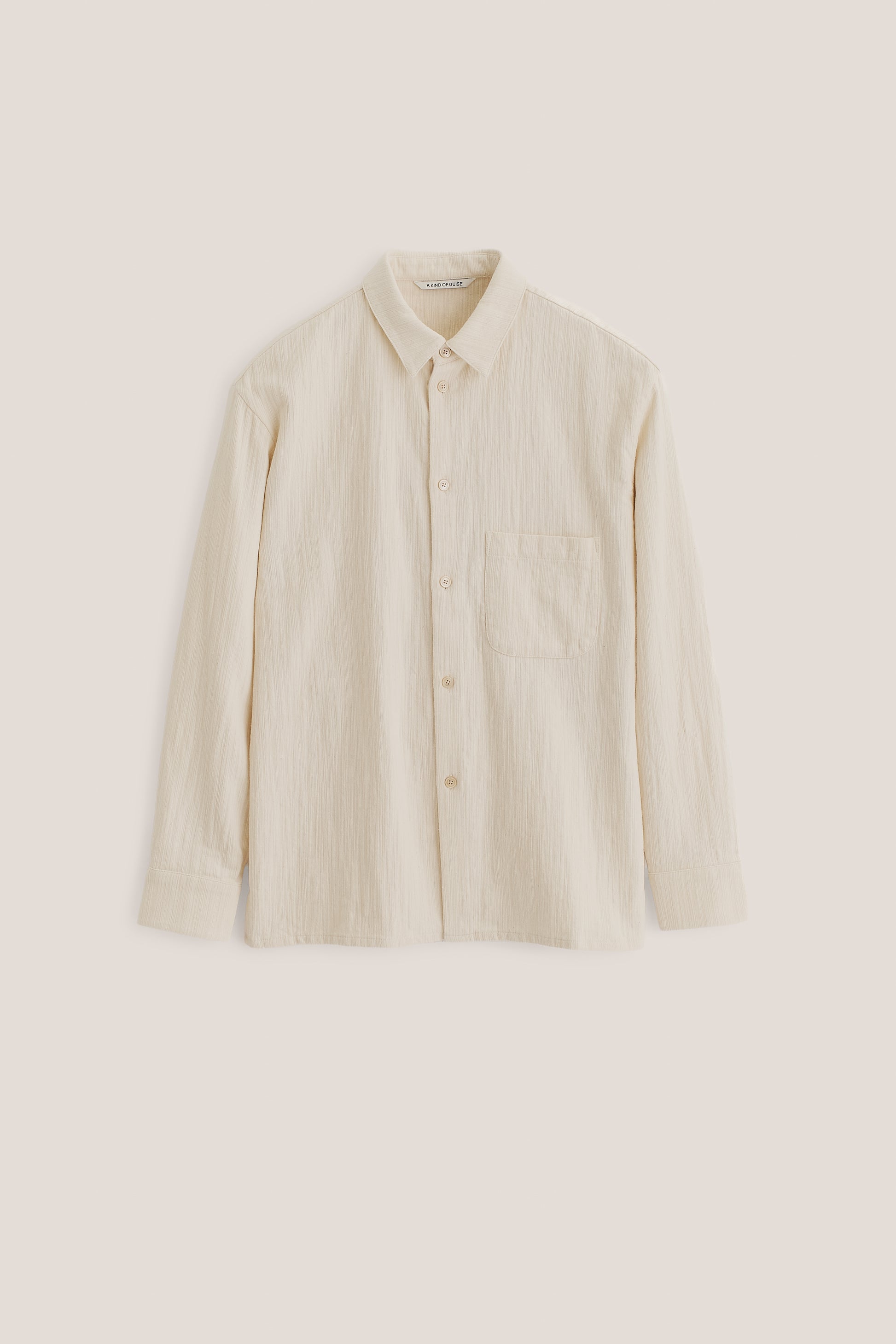 Men's long-sleeved shirt, recycled cotton mix, textured weave, off-white, oversized with patch pocket.