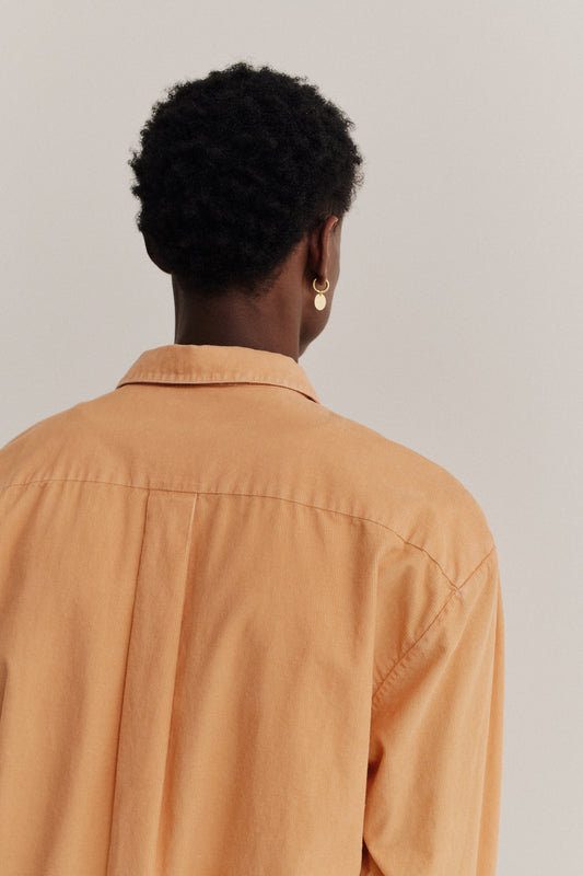 Men's long-sleeved shirt, 100% cotton light corduroy, garment washed, in a rich orange hue.