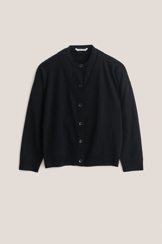 Women's knit cardigan, 100% merino wool, black, with mock underlayer and ajour knit pattern.