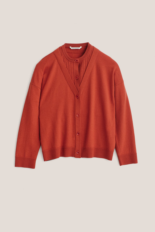 Women's knit cardigan, 100% merino wool, rust, with mock underlayer and ajour knit pattern.