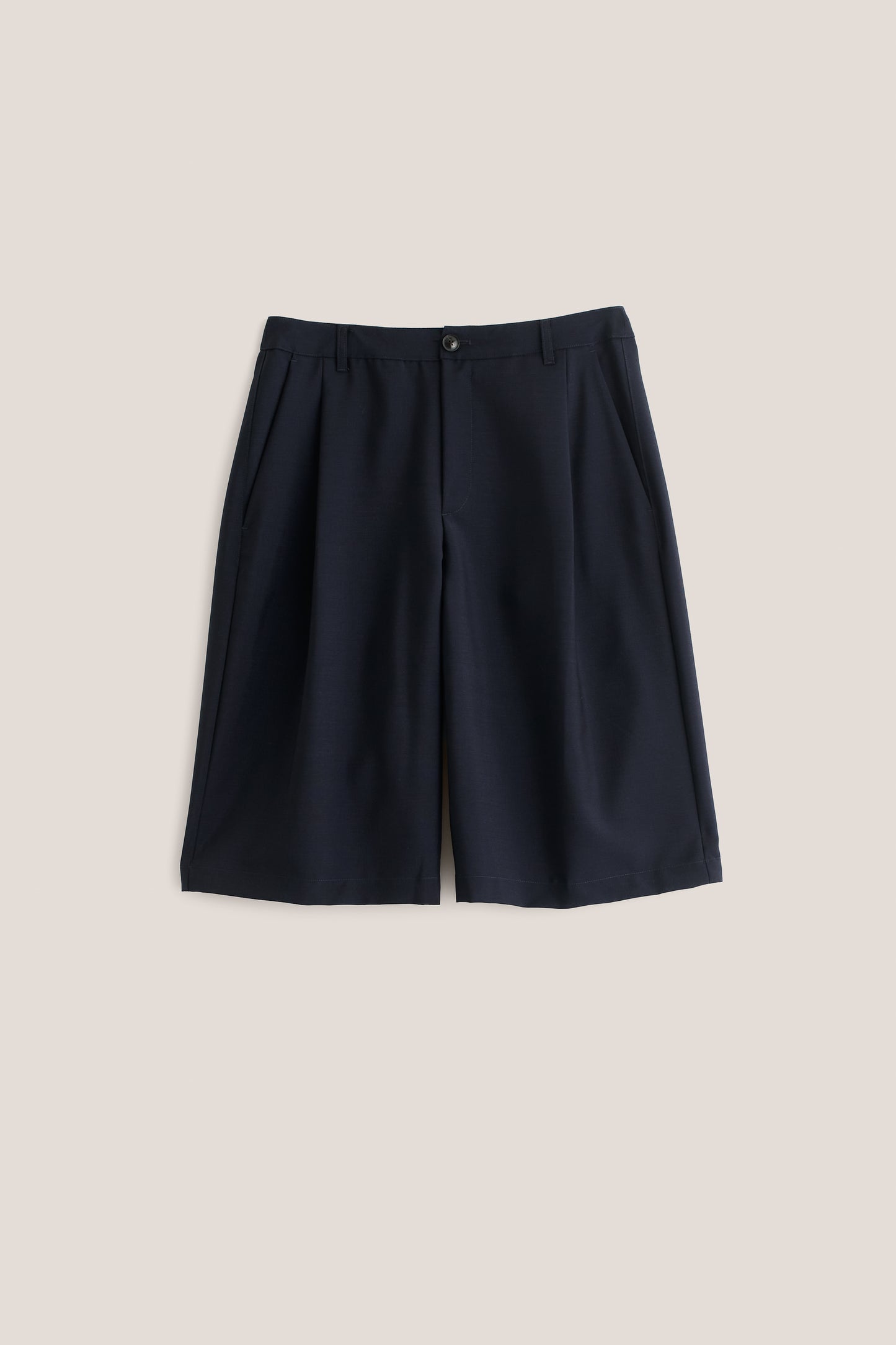 Unisex tailoring shorts, 100% virgin wool, dark navy, knee-length, relaxed fit, wide leg, single pleat.