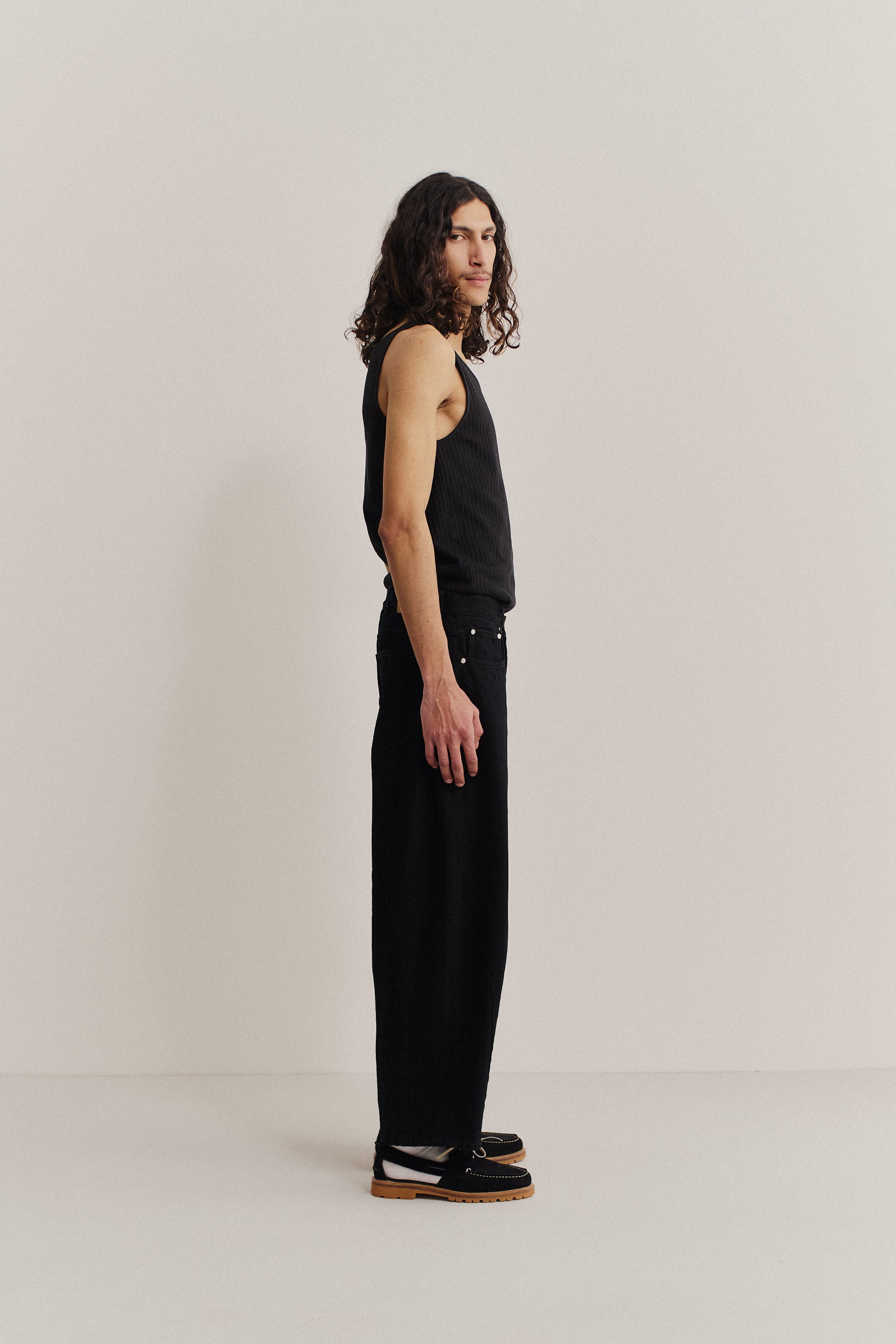 Men's long-pants, selvedge denim, black, wide-leg, cropped, o-shaped silhouette.