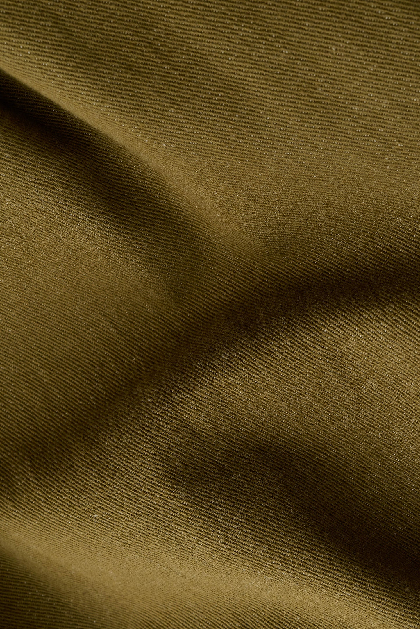 Men's long-pants, Kandan Jeans, 100% cotton selvage denim, olive green, with subtle fabric texture.
