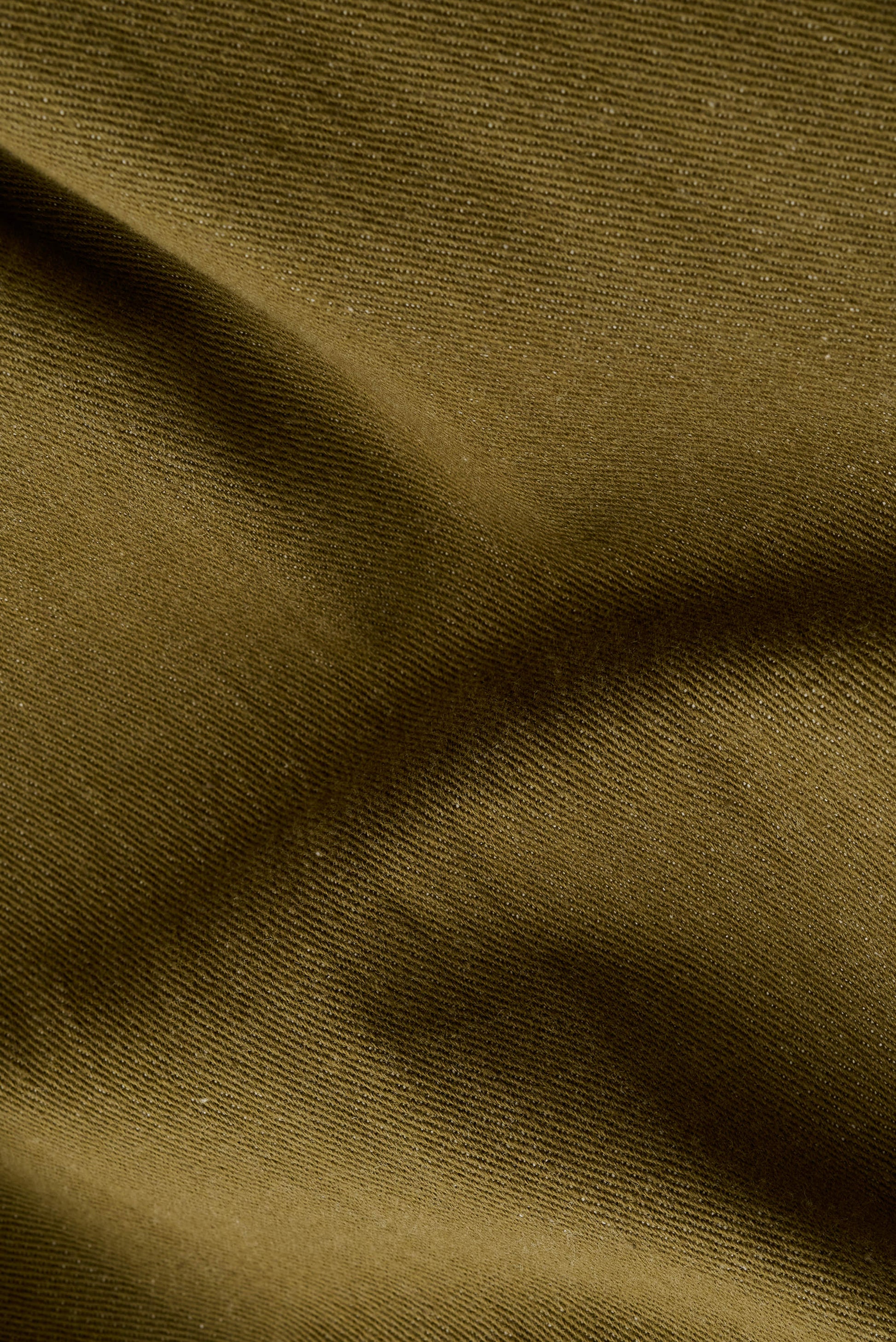 Men's long-pants, Kandan Jeans, 100% cotton selvage denim, olive green, with subtle fabric texture.