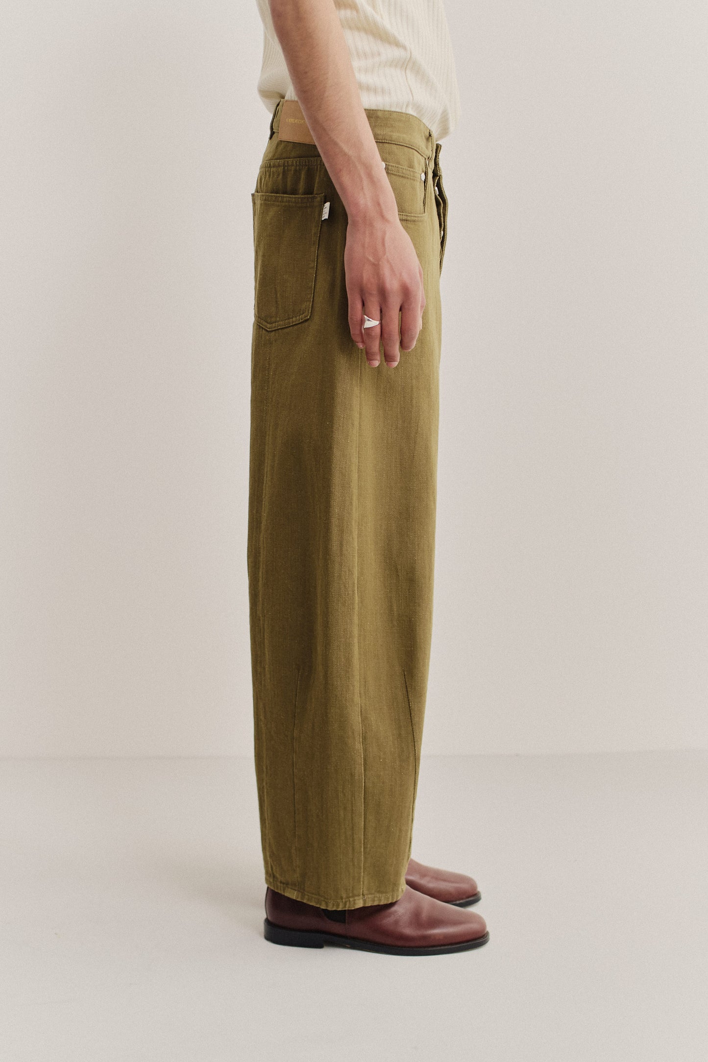 Men's long-pants, 100% cotton selvage denim, washed olive green, wide cropped tapered leg.
