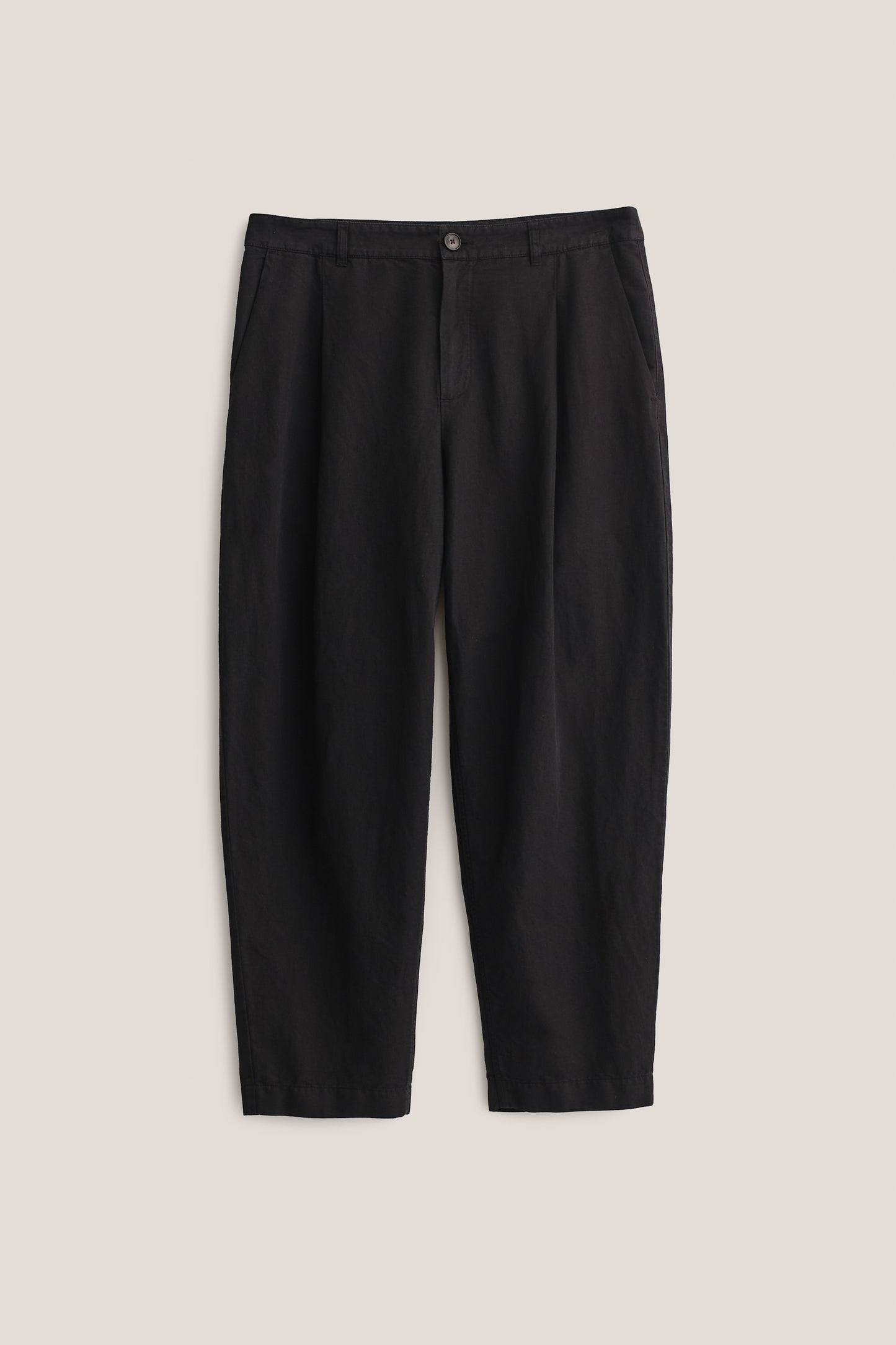 Men's long-pants, linen and cotton blend, garment-dyed black, with single front pleat and cropped tapered leg.