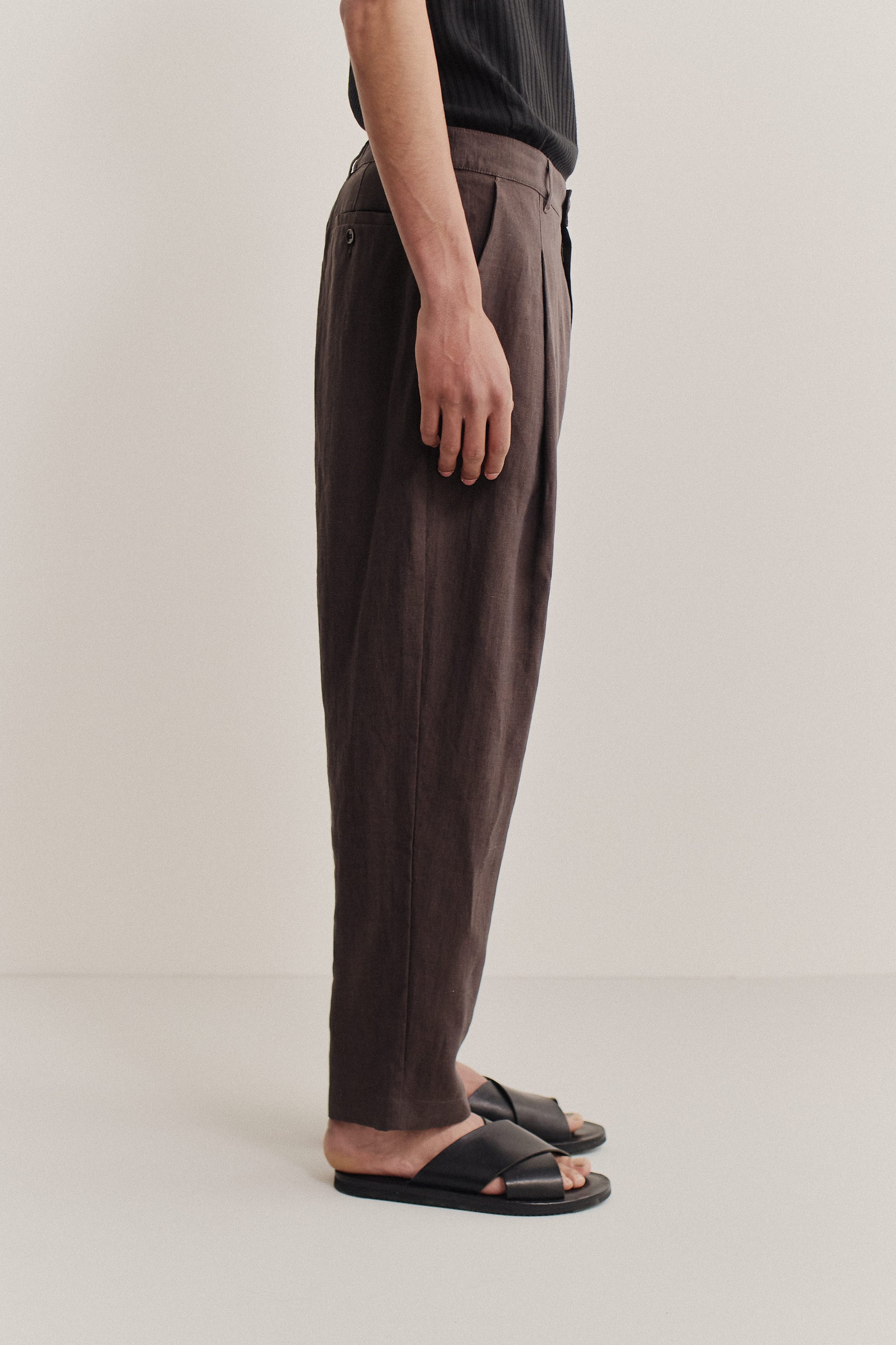 Men's long-pants, 100% linen, single front pleat, tapered leg, dark brown.